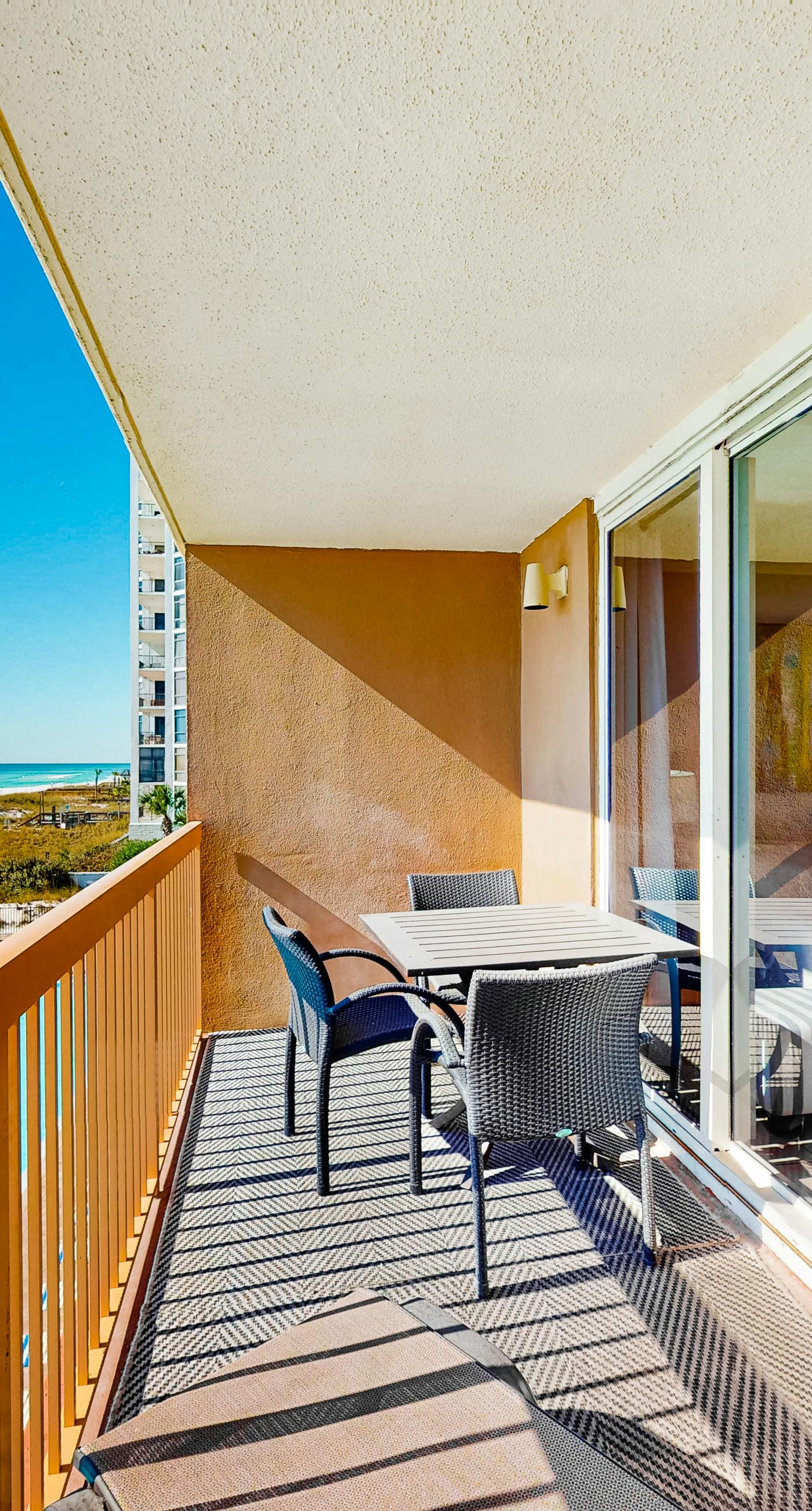 Gulf-front condo with balcony, water views, pools, hot tub & beach access