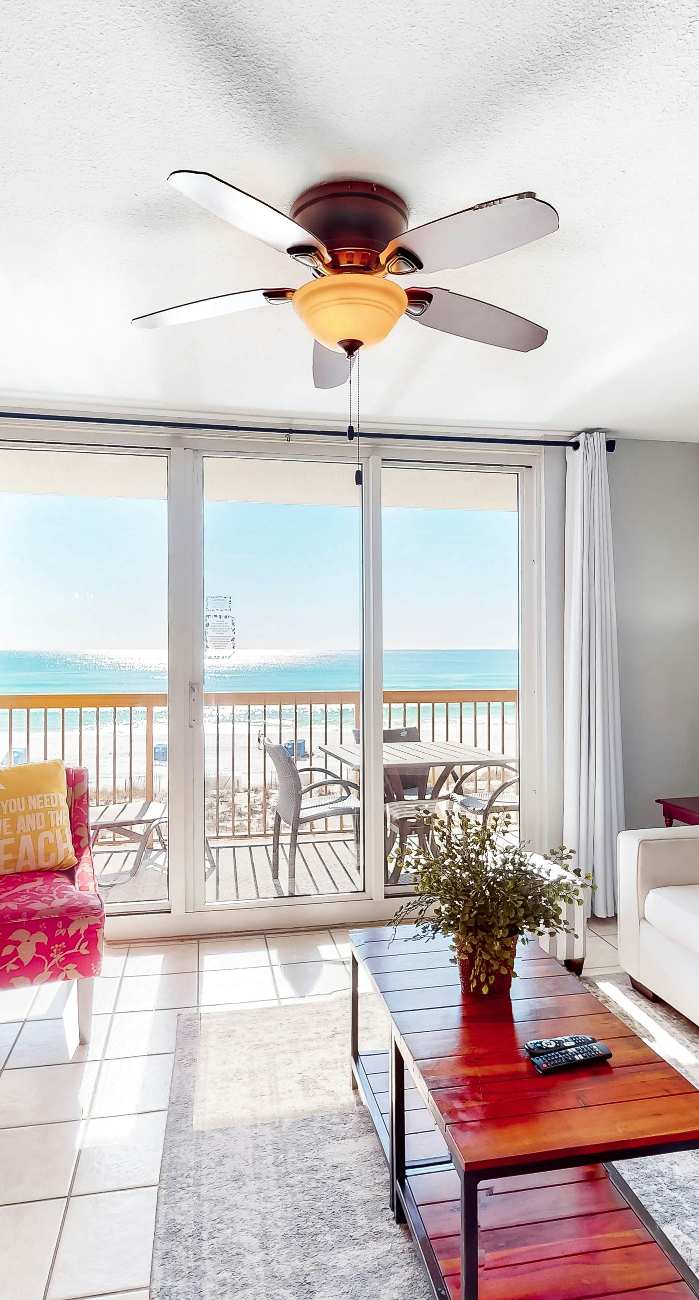 Gulf-front condo with balcony, water views, pools, hot tub & beach access