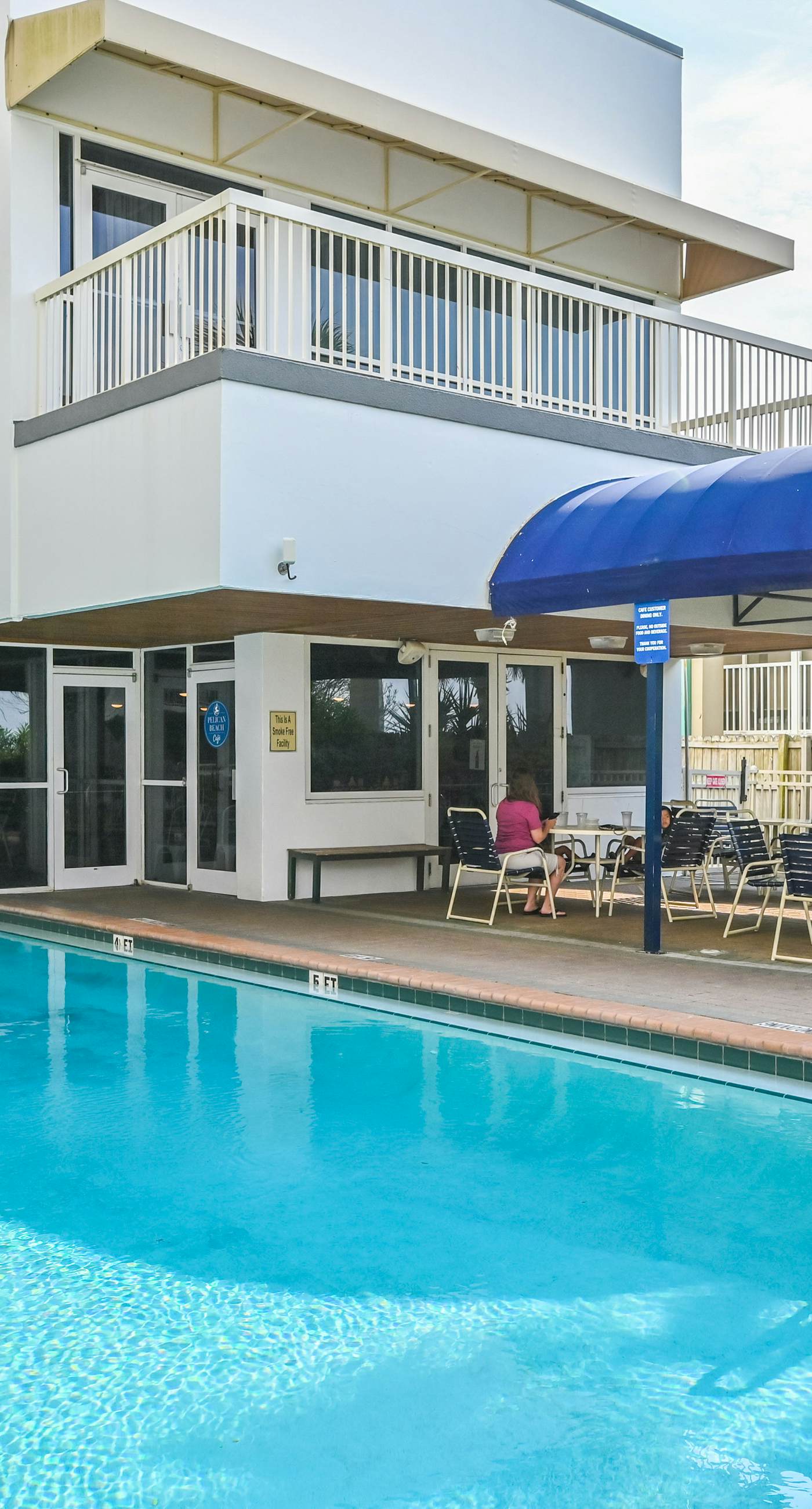 Gulf-front condo with balcony, water views, pools, hot tub & beach access