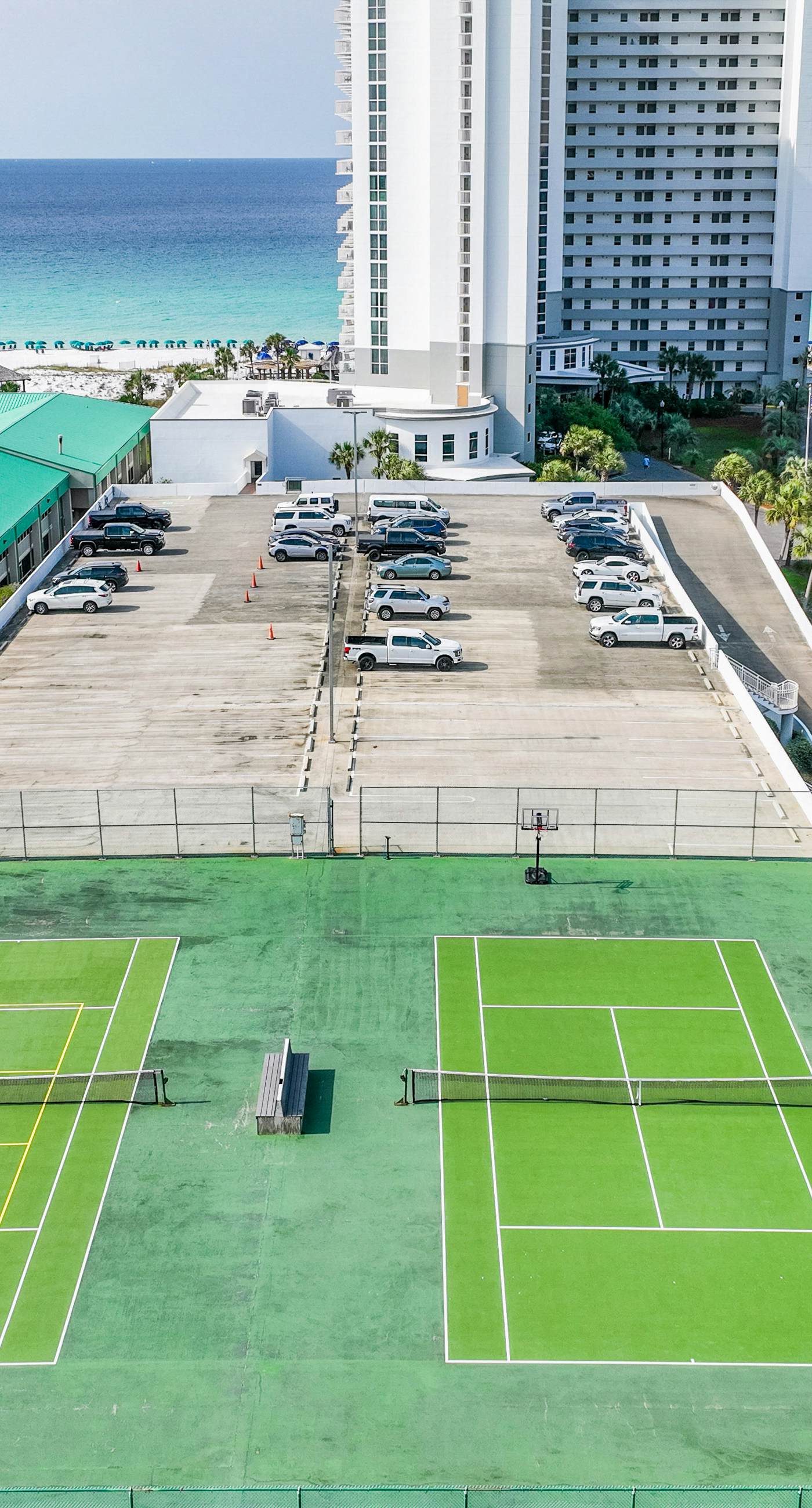 Gulf-front condo with balcony, water views, pools, hot tub & beach access