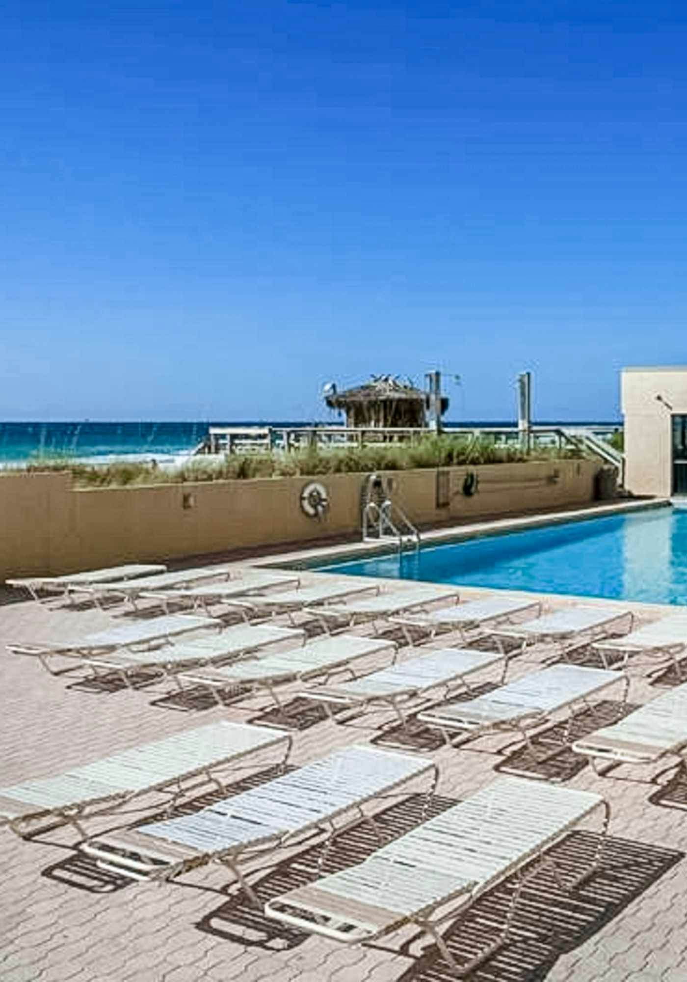 Eleventh-floor ocean view condo with pool, hot tub, central AC, gym, & game room