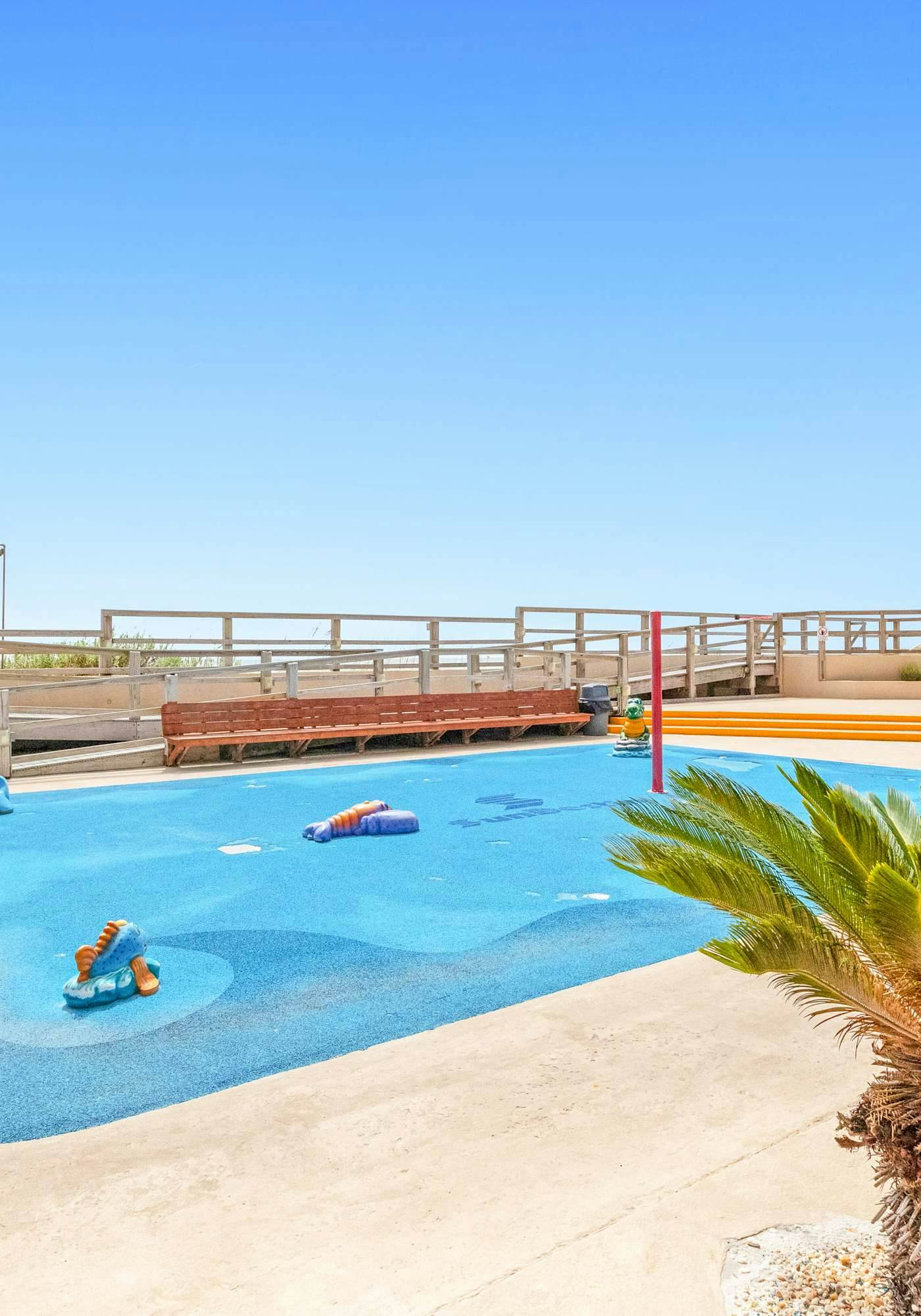 Eleventh-floor ocean view condo with pool, hot tub, central AC, gym, & game room