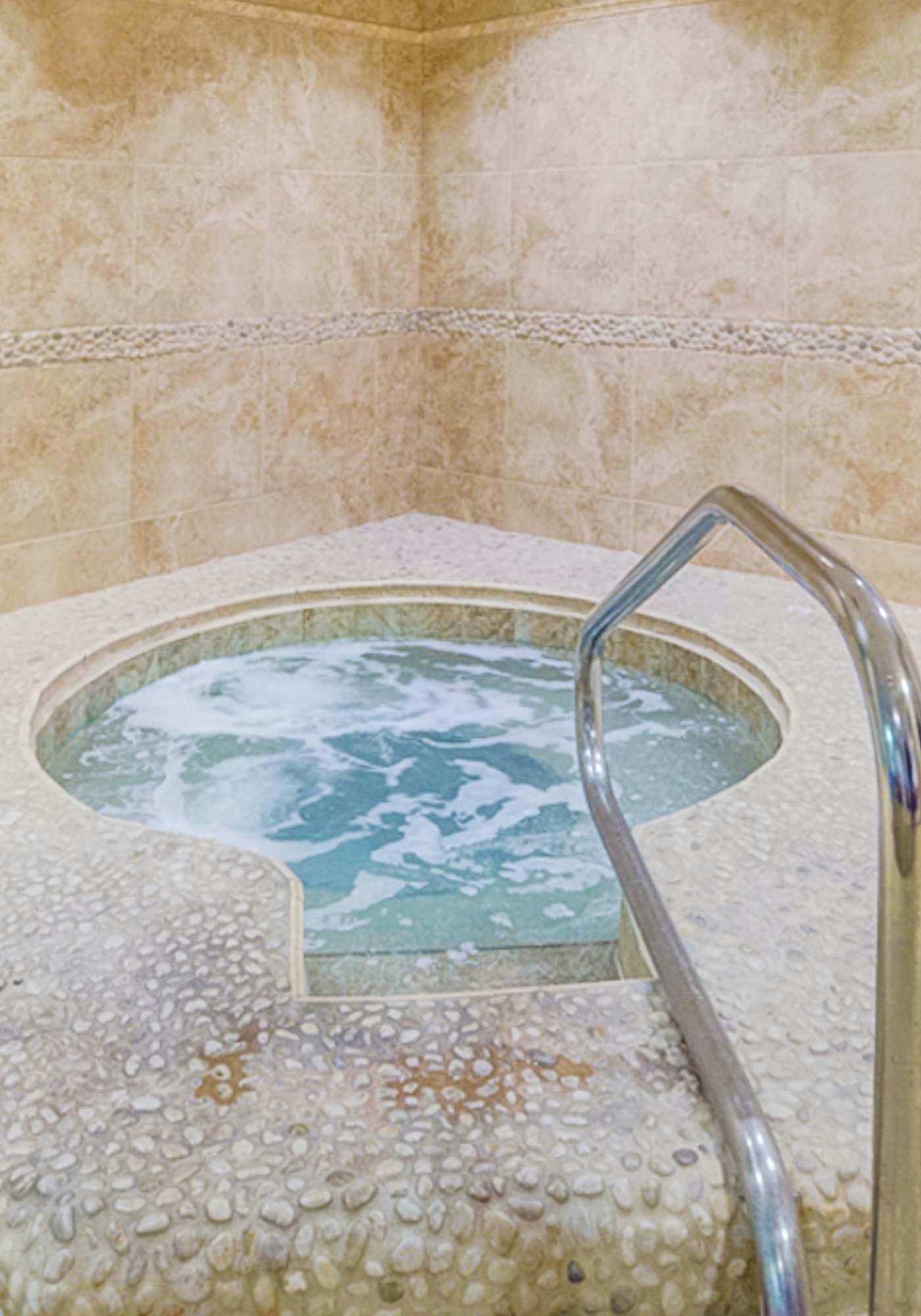 Eleventh-floor ocean view condo with pool, hot tub, central AC, gym, & game room