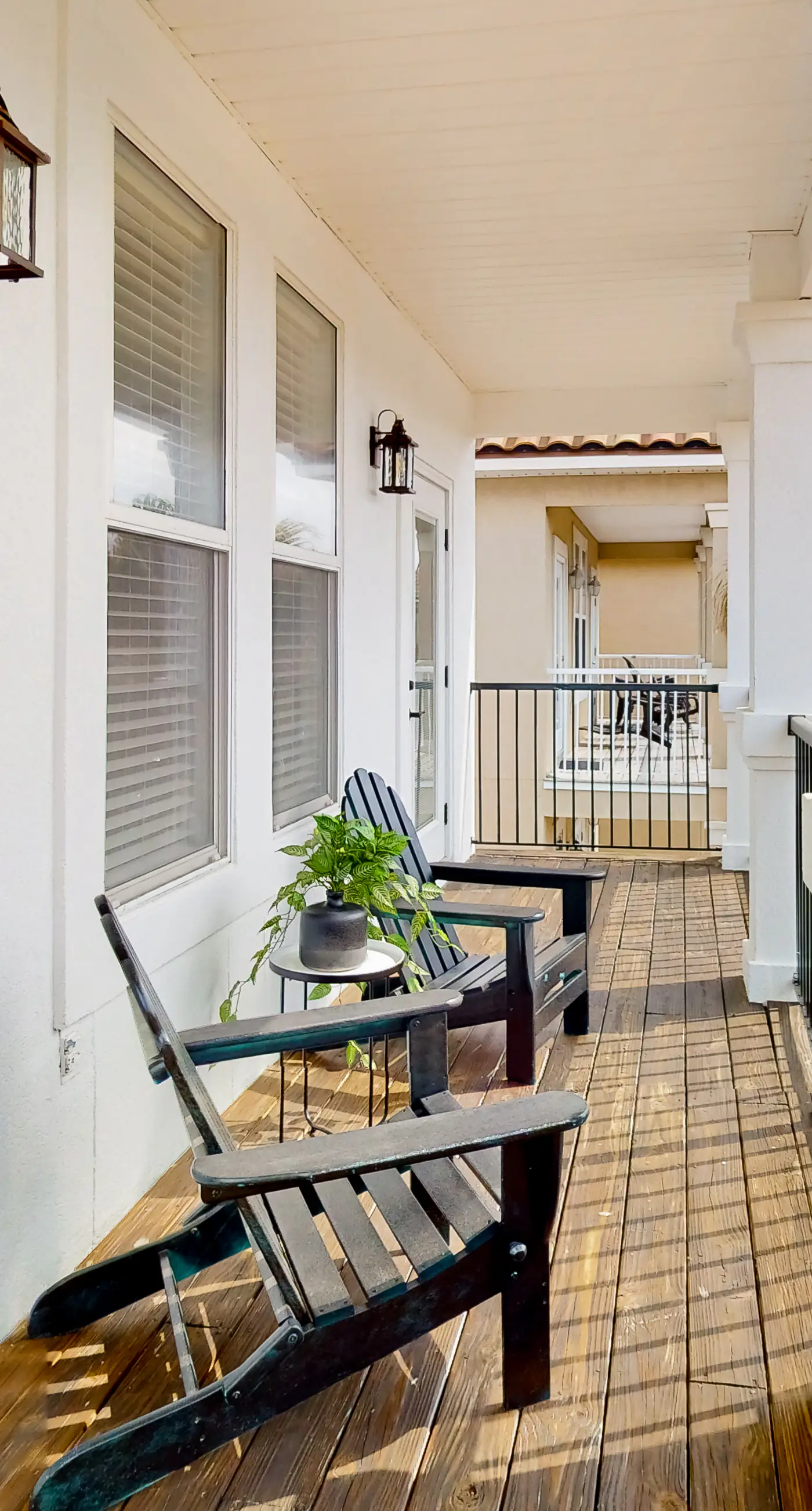 Dog-friendly home near beach with pool access, two balconies, wet bar, & W/D