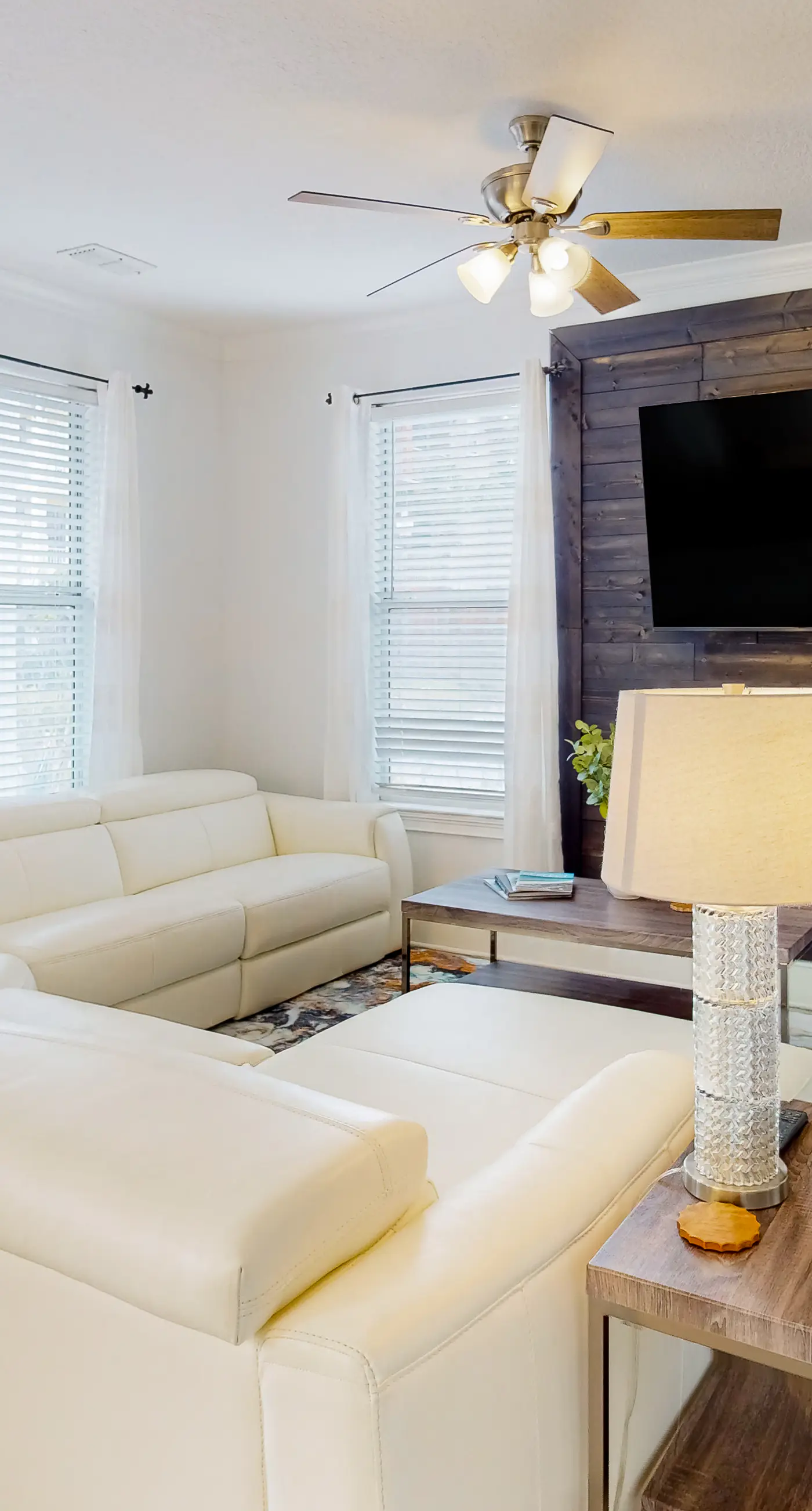 Dog-friendly home near beach with pool access, two balconies, wet bar, & W/D