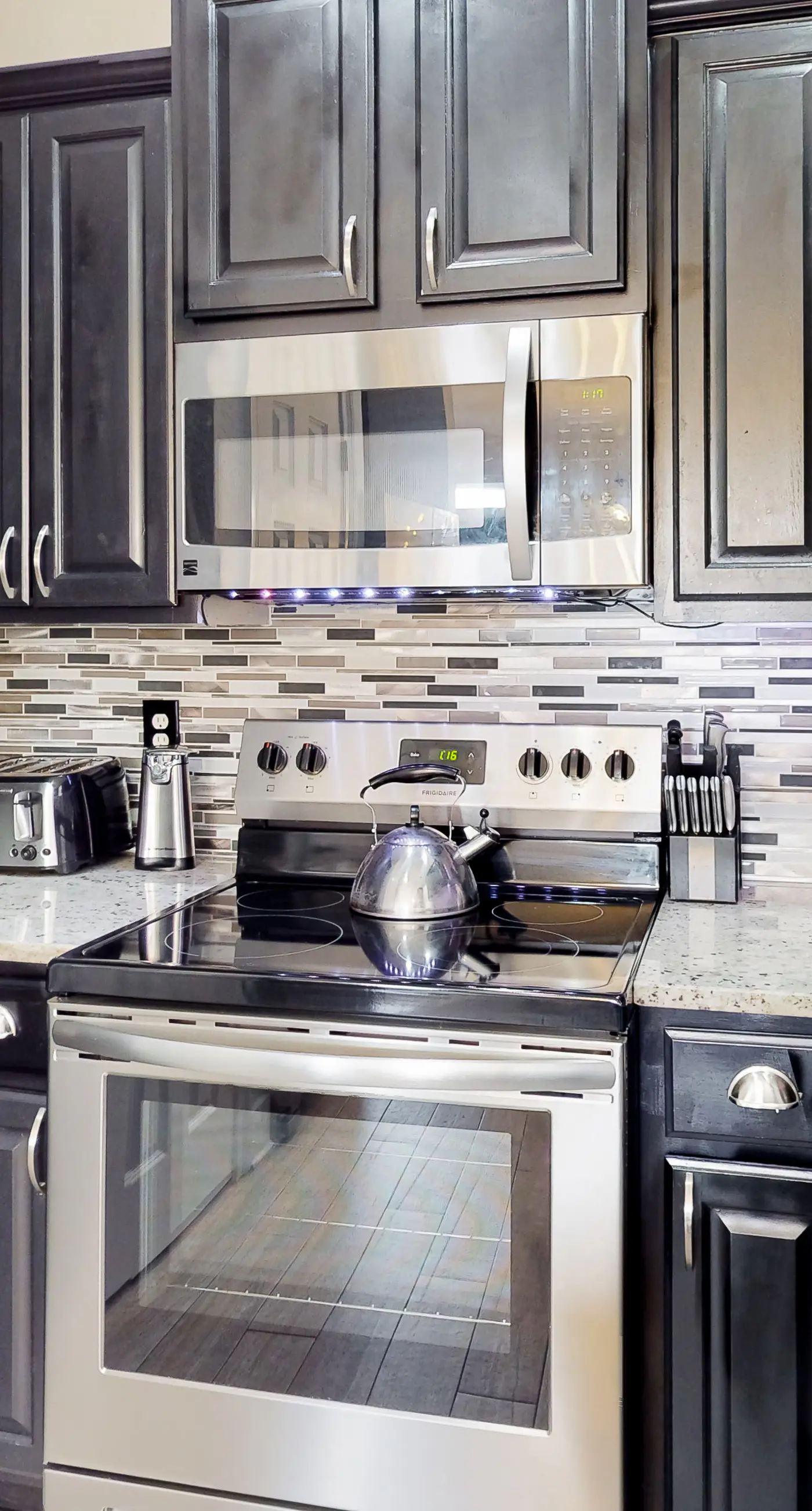 Dog-friendly home near beach with pool access, two balconies, wet bar, & W/D