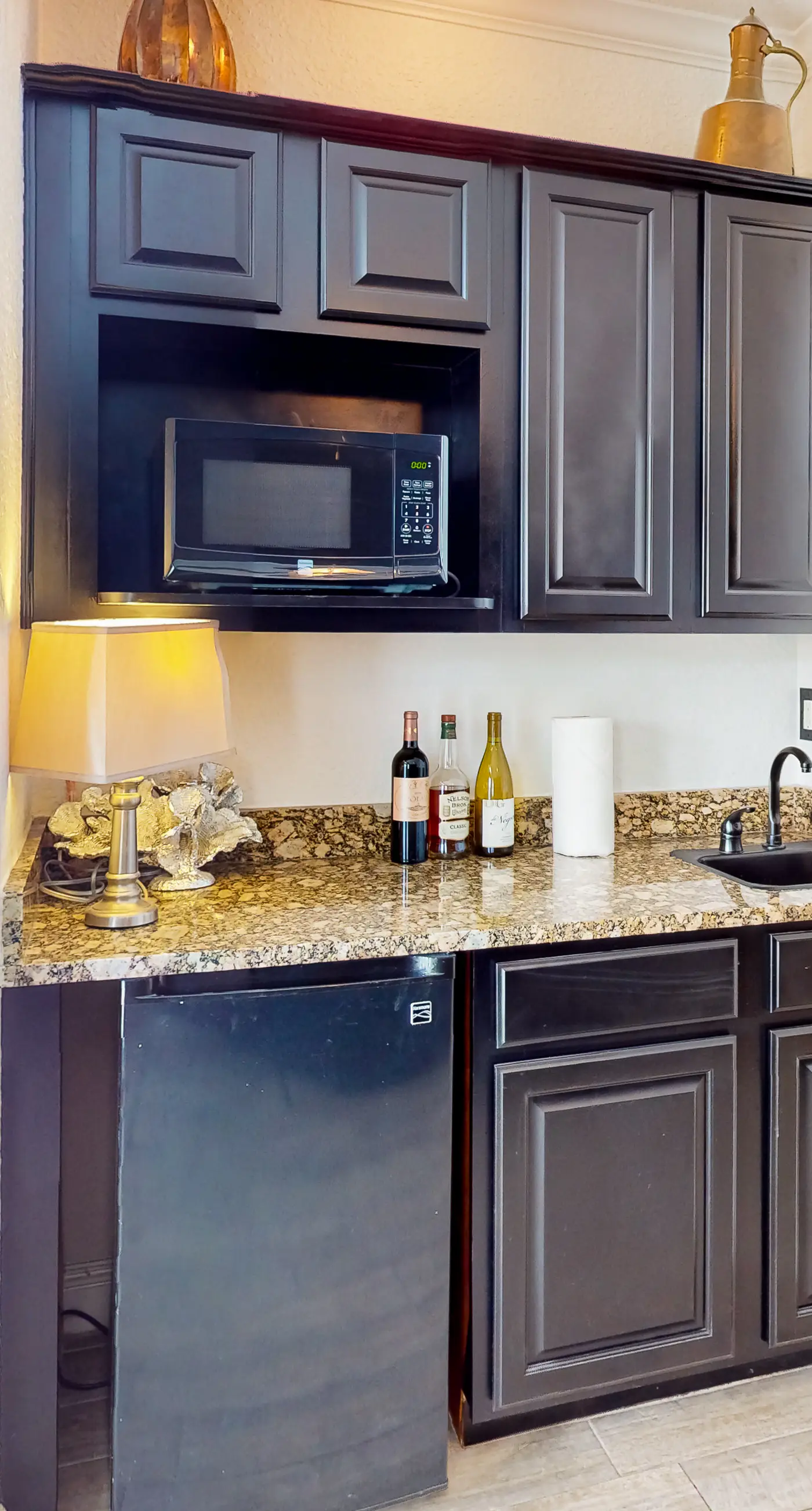 Dog-friendly home near beach with pool access, two balconies, wet bar, & W/D