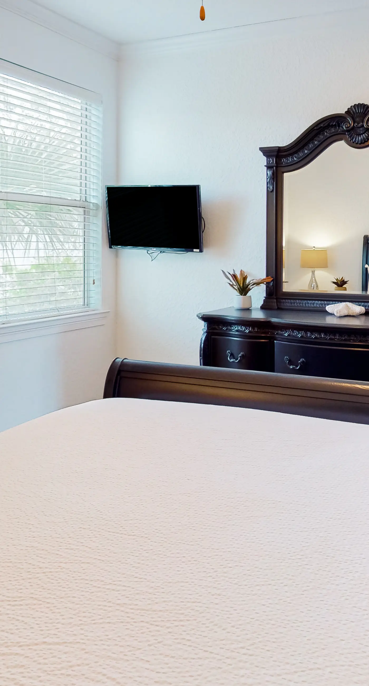 Dog-friendly home near beach with pool access, two balconies, wet bar, & W/D