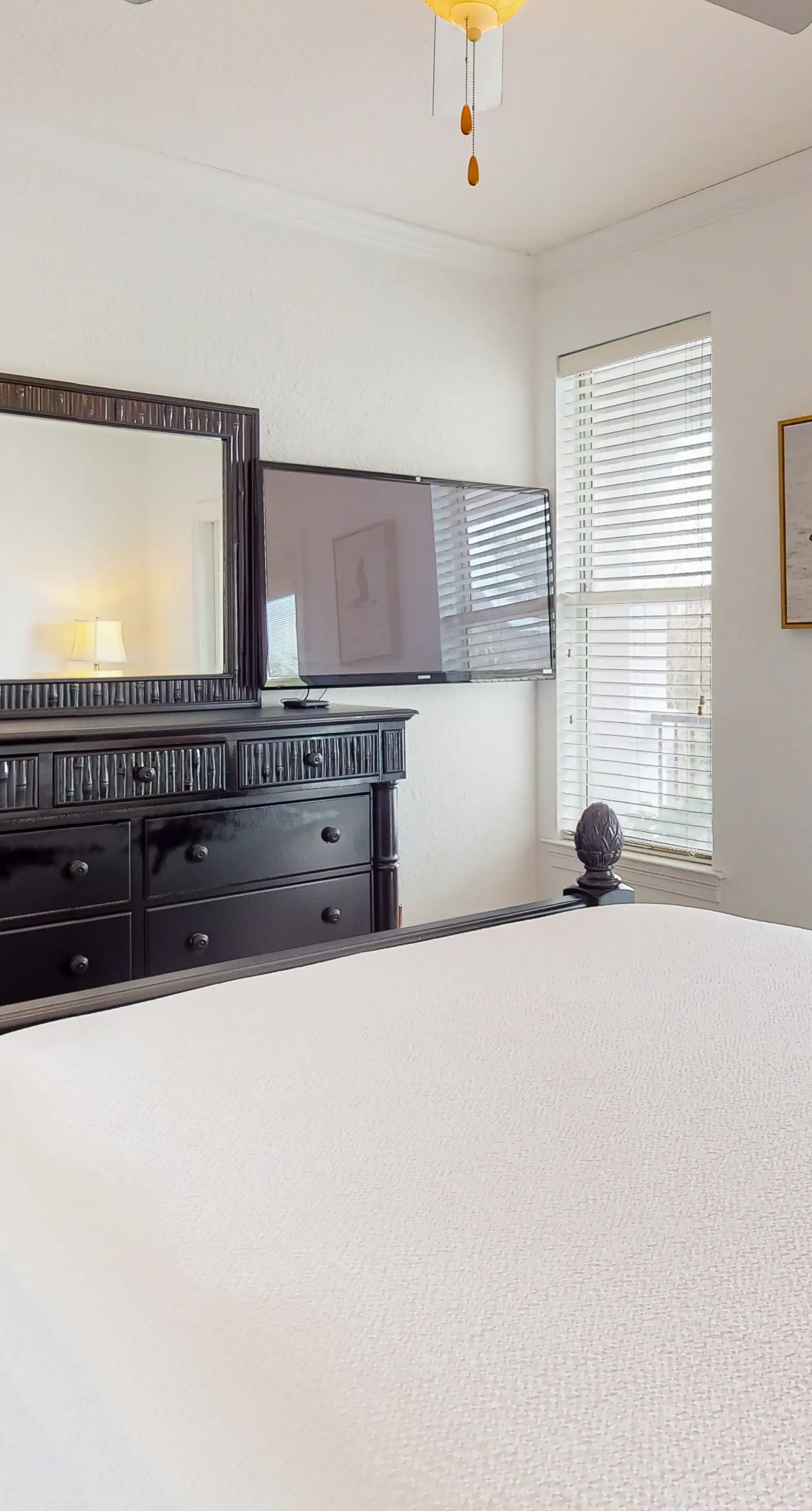 Dog-friendly home near beach with pool access, two balconies, wet bar, & W/D