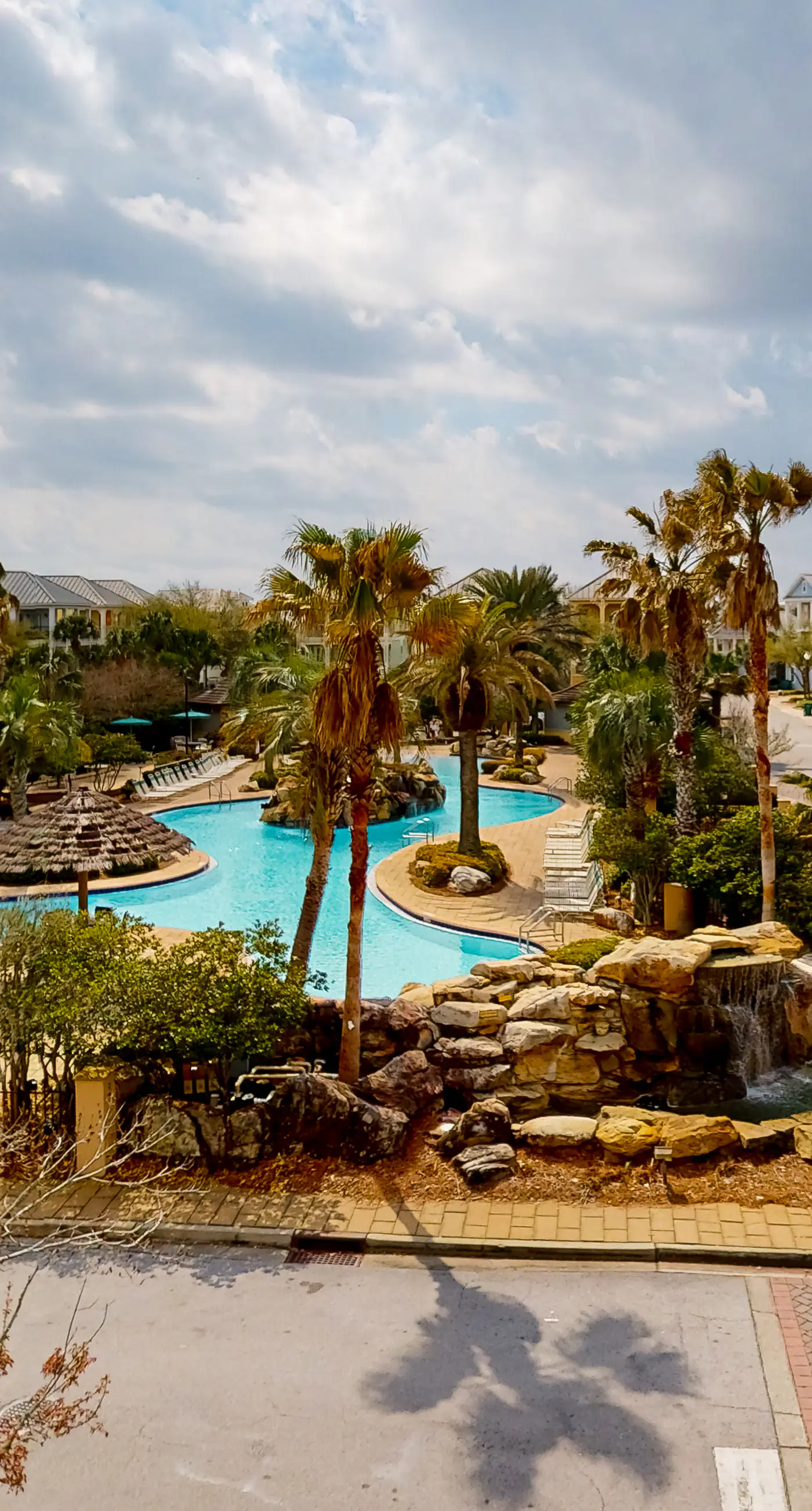 Dog-friendly home near beach with pool access, two balconies, wet bar, & W/D