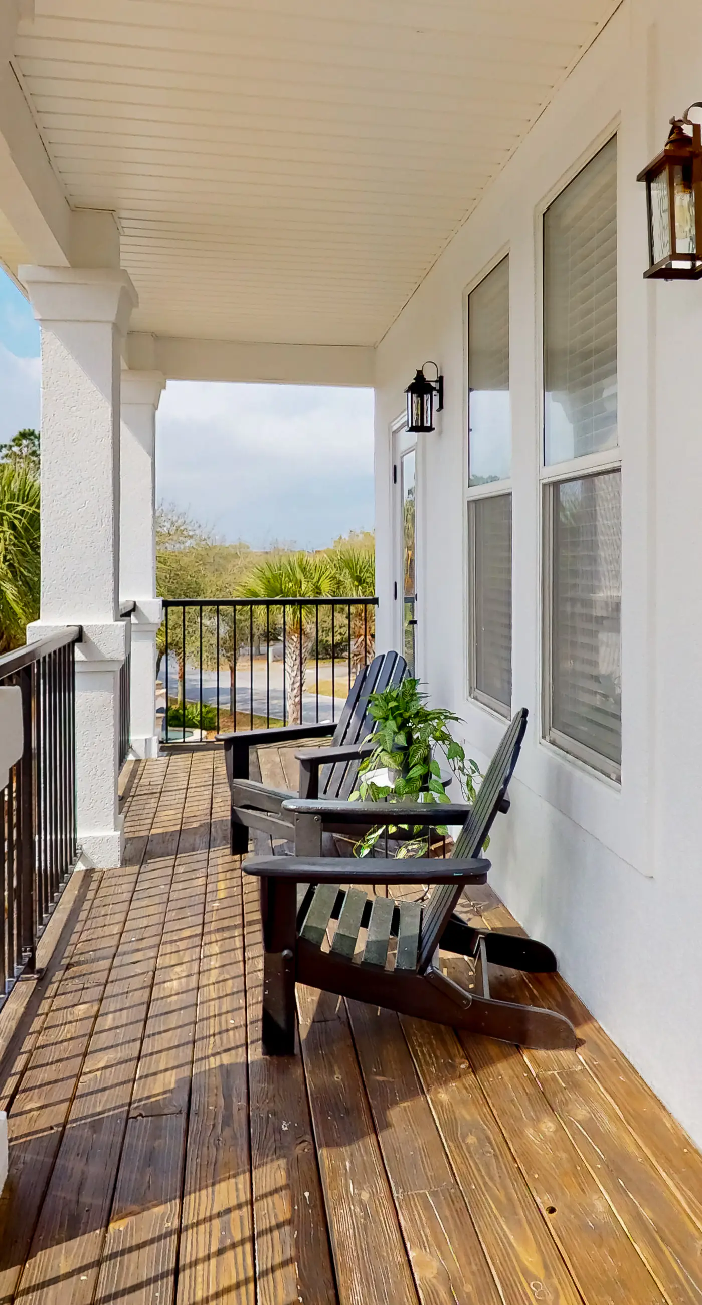 Dog-friendly home near beach with pool access, two balconies, wet bar, & W/D