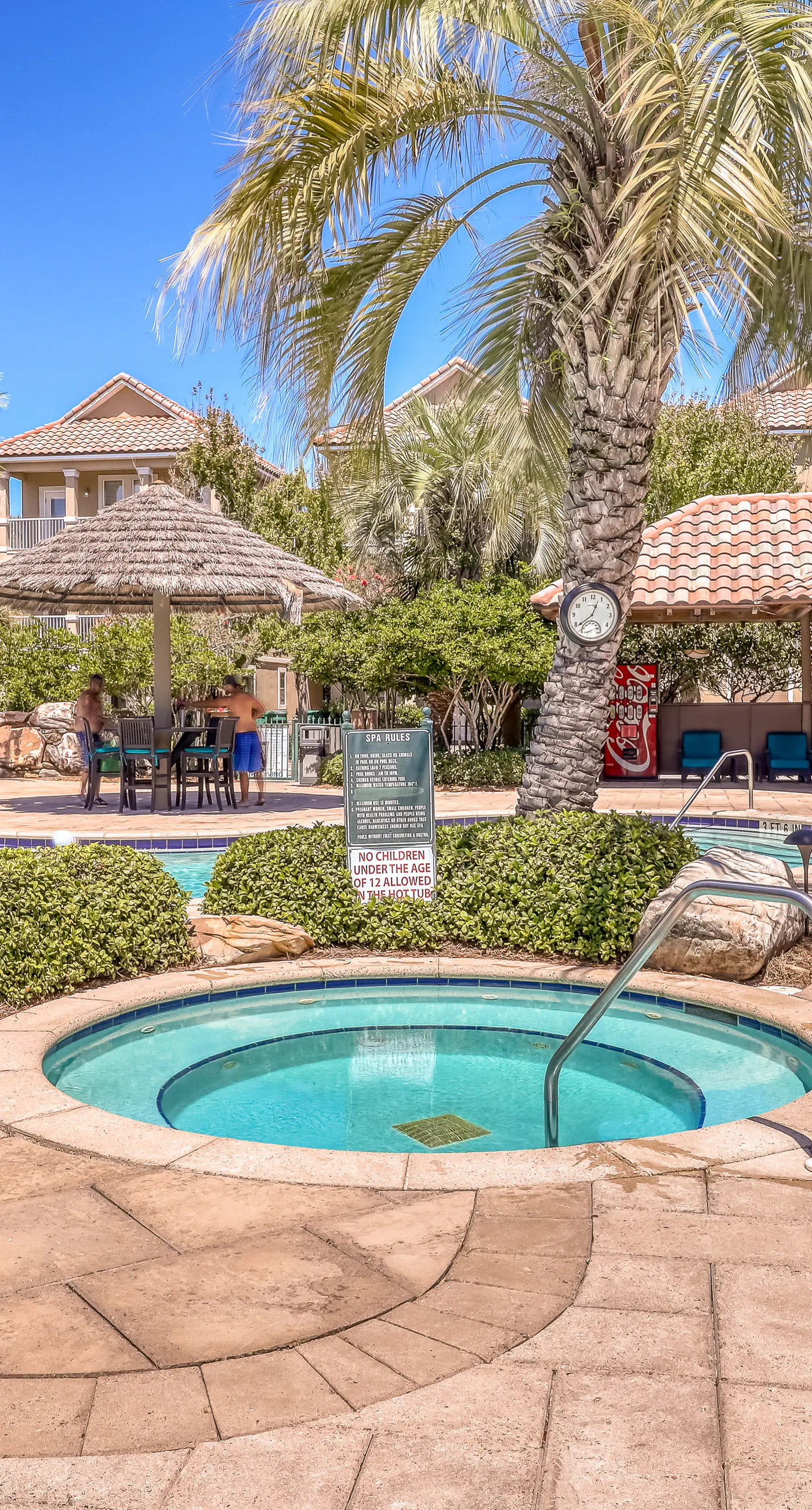 Dog-friendly home near beach with pool access, two balconies, wet bar, & W/D