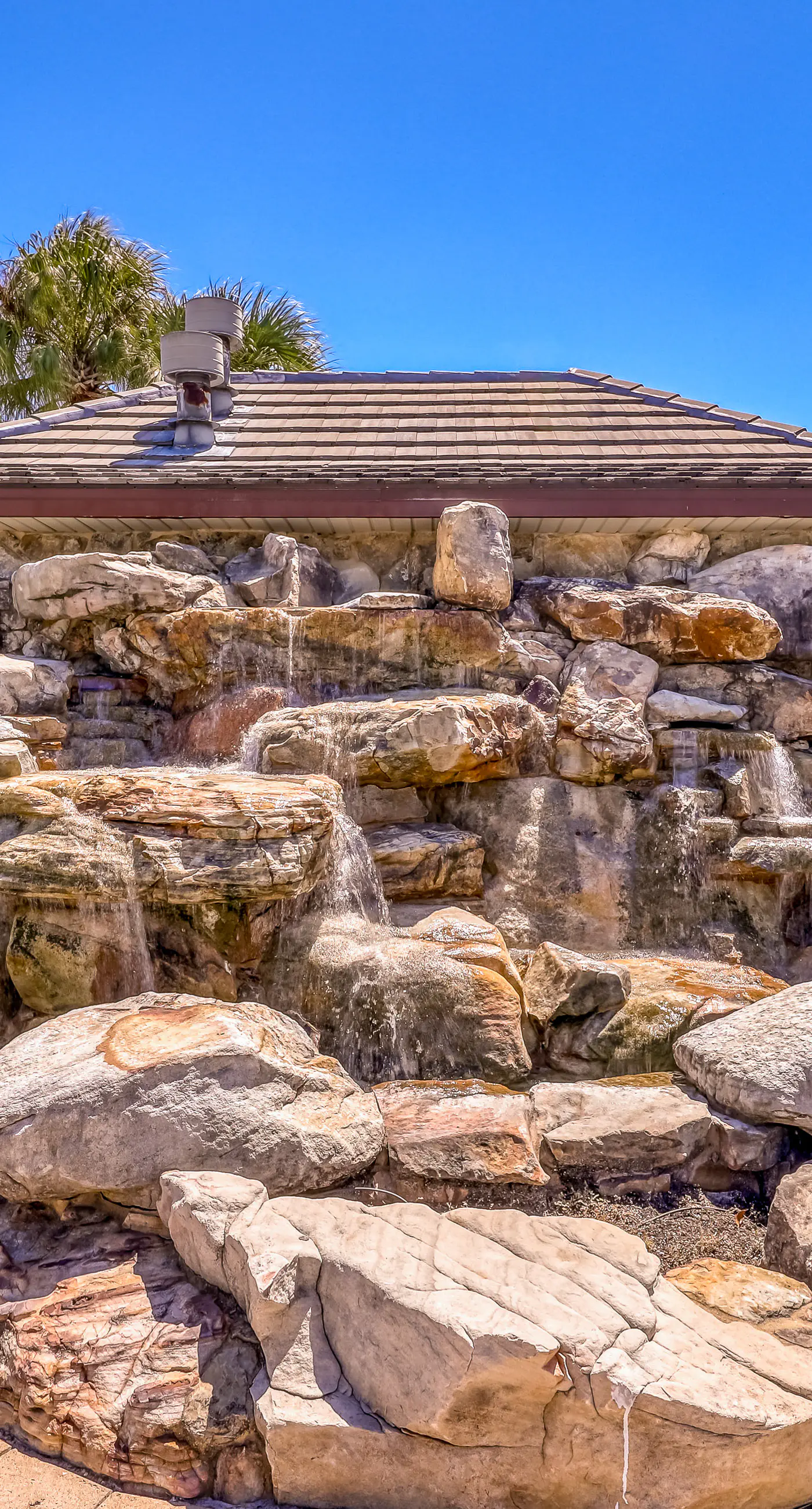 Dog-friendly home near beach with pool access, two balconies, wet bar, & W/D