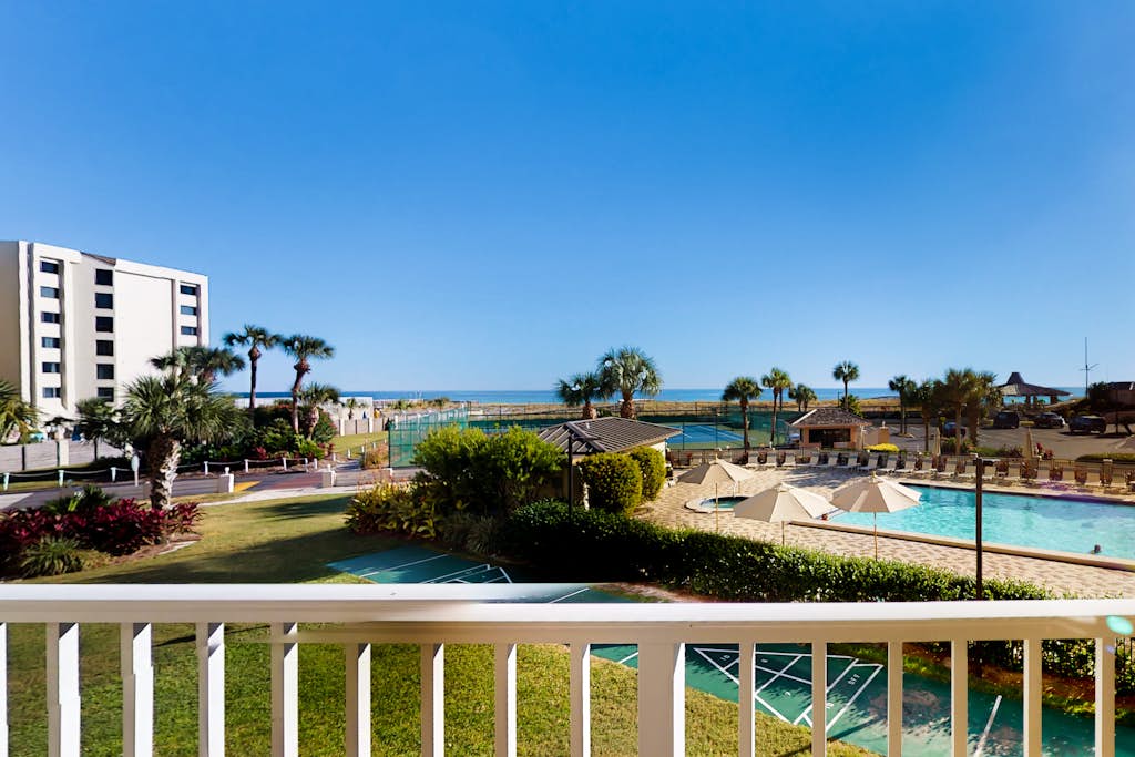 Colorful Gulf-view condo with pools, hot tub, tennis, gym & easy beach access