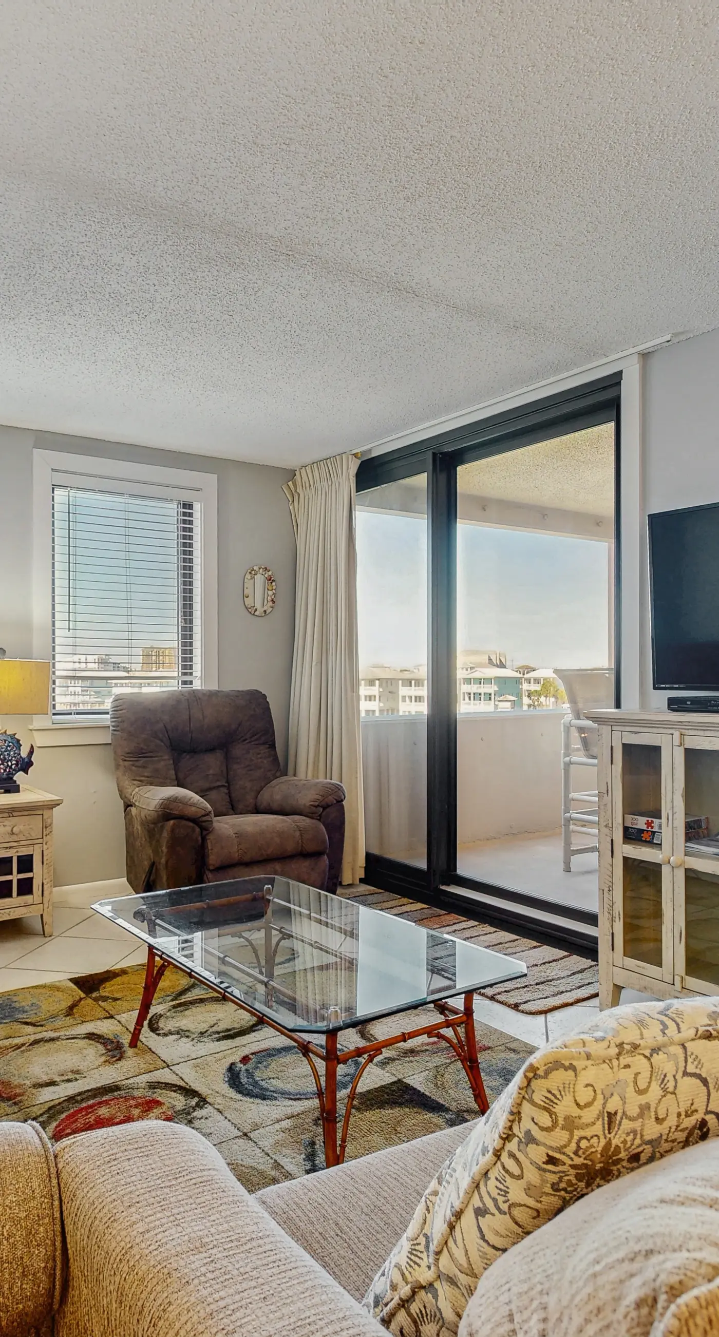 Water-view condo with heated pool, hot tub, sports courts & on-site beach access