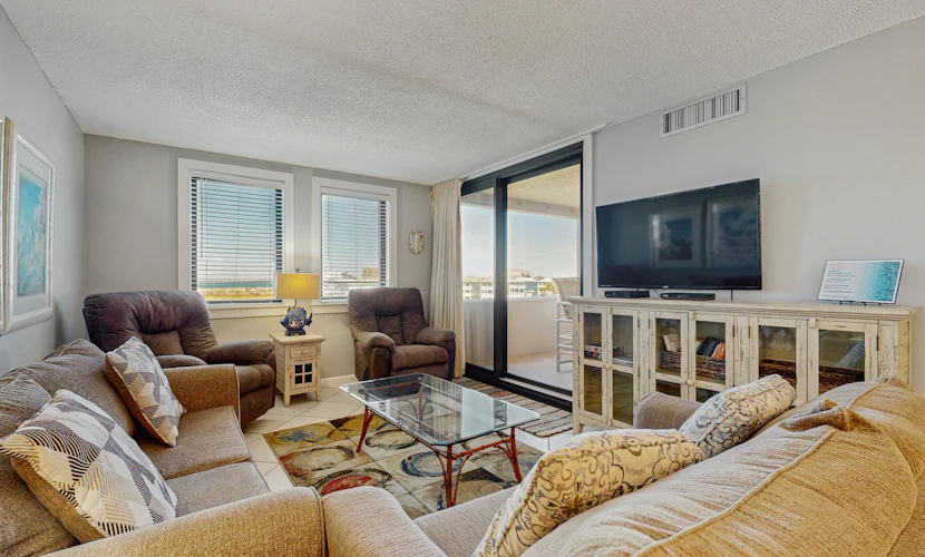 Water-view condo with heated pool, hot tub, sports courts & on-site beach access