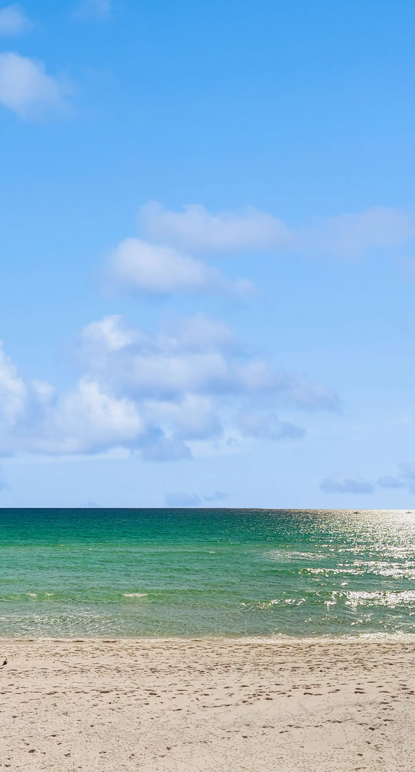 Water-view condo with heated pool, hot tub, sports courts & on-site beach access