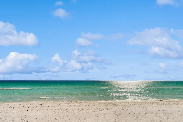 Water-view condo with heated pool, hot tub, sports courts & on-site beach access