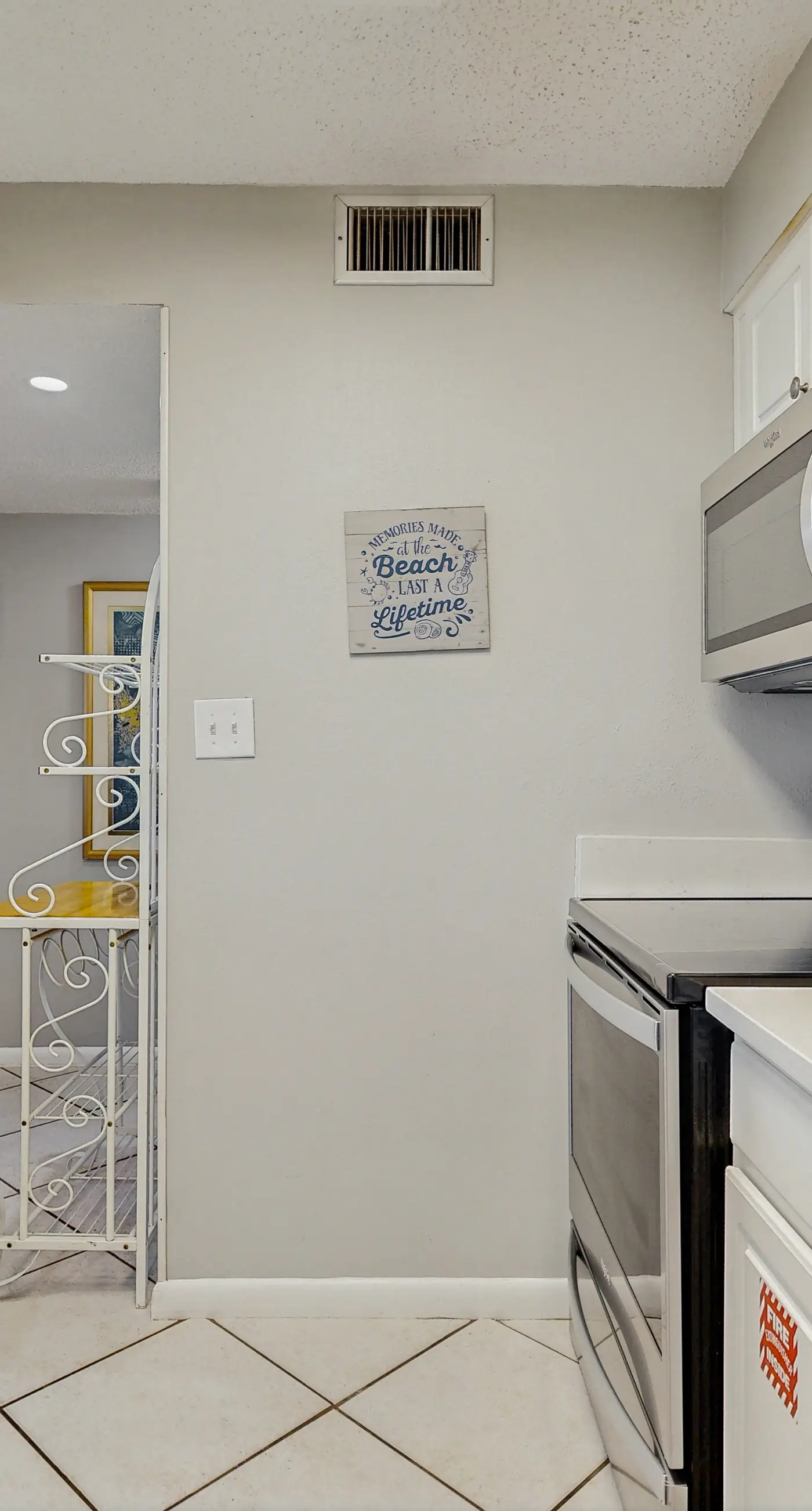 Water-view condo with heated pool, hot tub, sports courts & on-site beach access