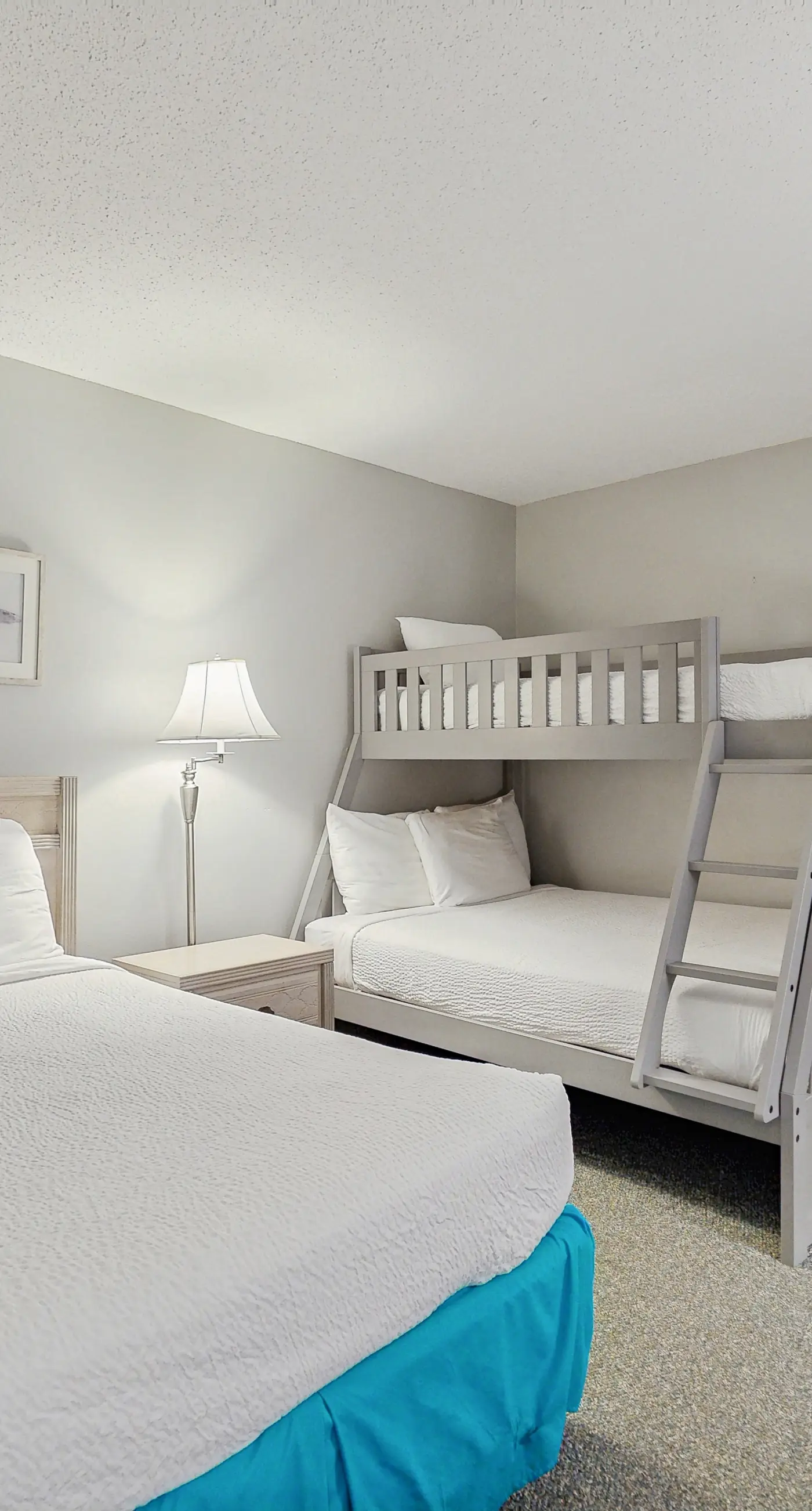 Water-view condo with heated pool, hot tub, sports courts & on-site beach access