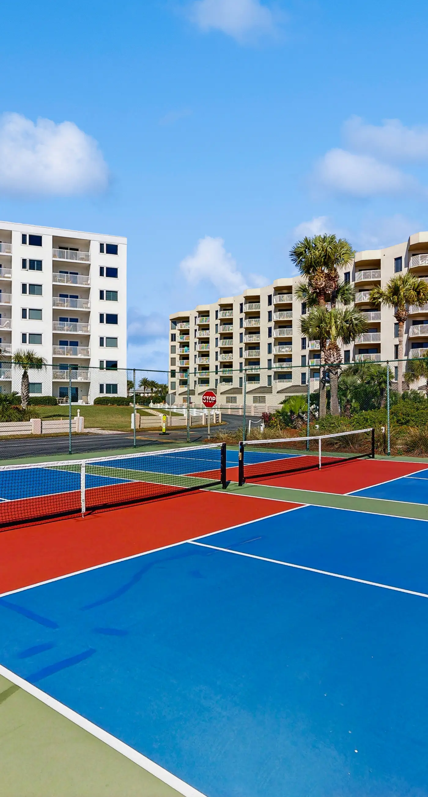 Water-view condo with heated pool, hot tub, sports courts & on-site beach access
