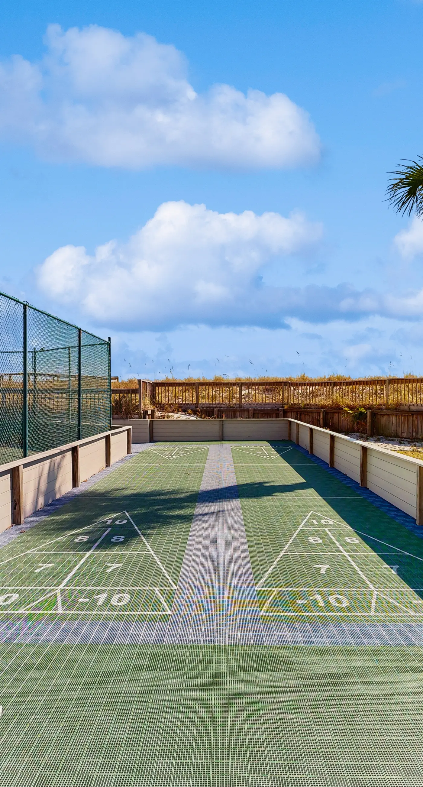 Water-view condo with heated pool, hot tub, sports courts & on-site beach access