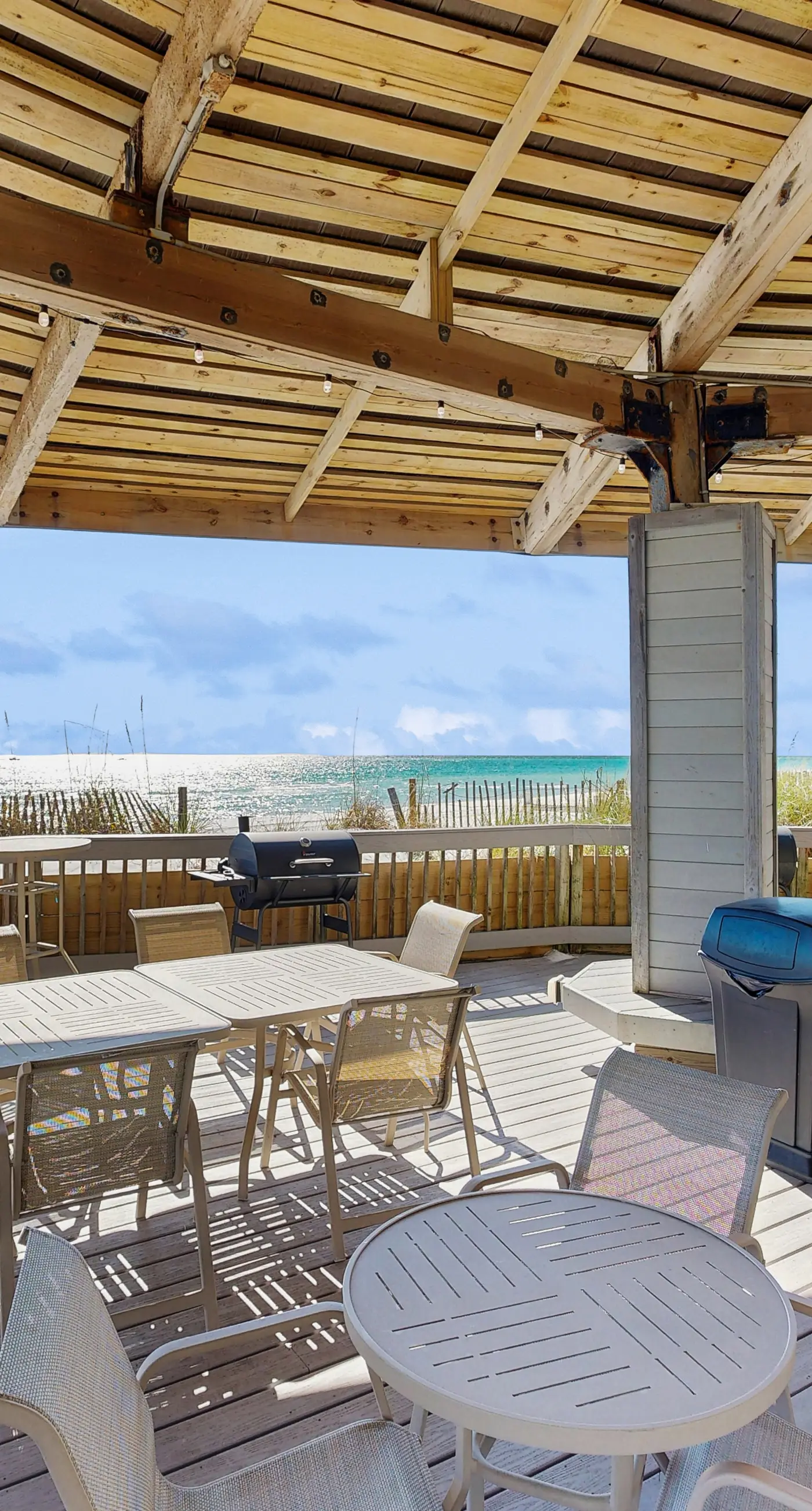 Water-view condo with heated pool, hot tub, sports courts & on-site beach access