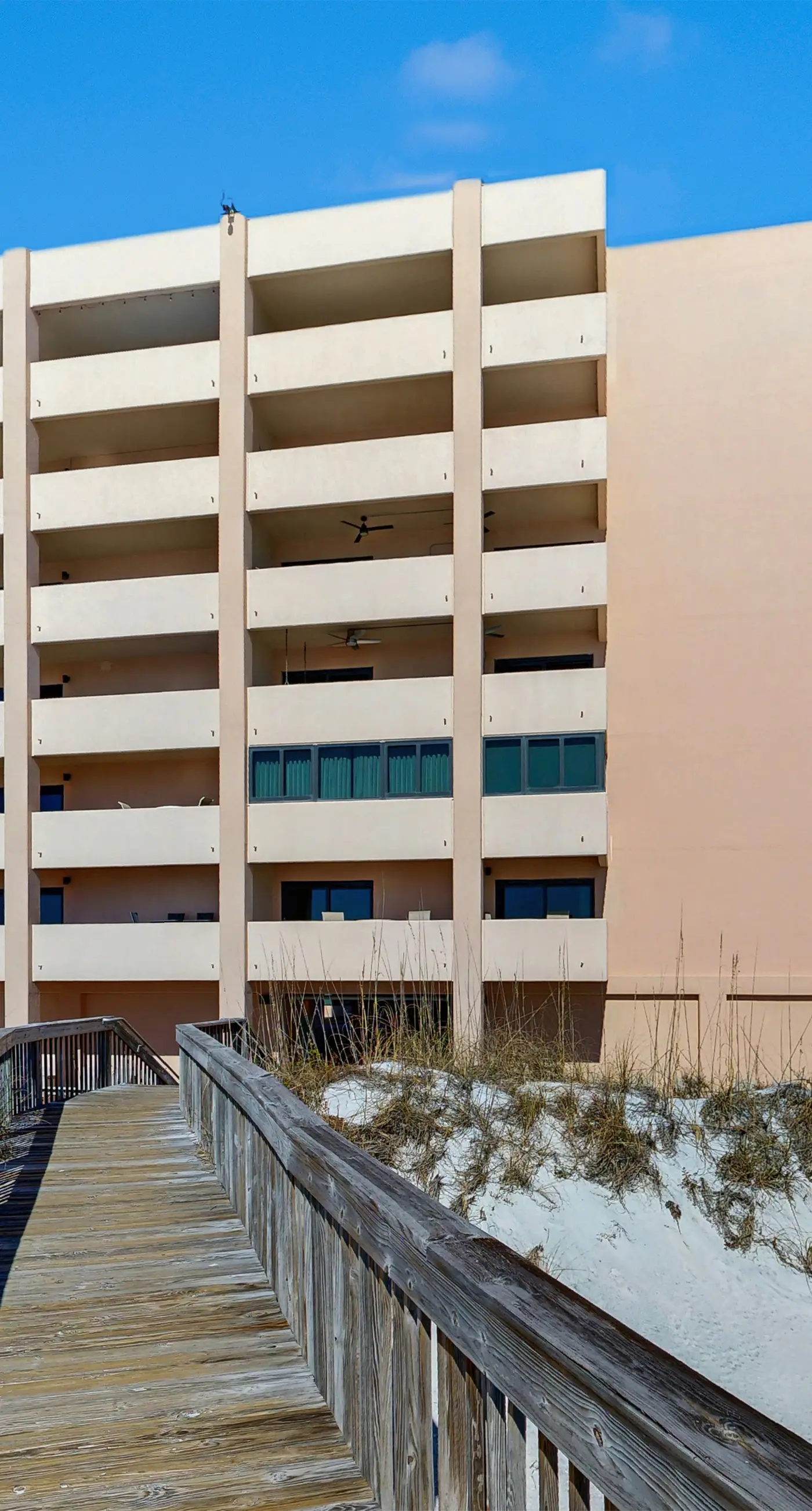 Water-view condo with heated pool, hot tub, sports courts & on-site beach access