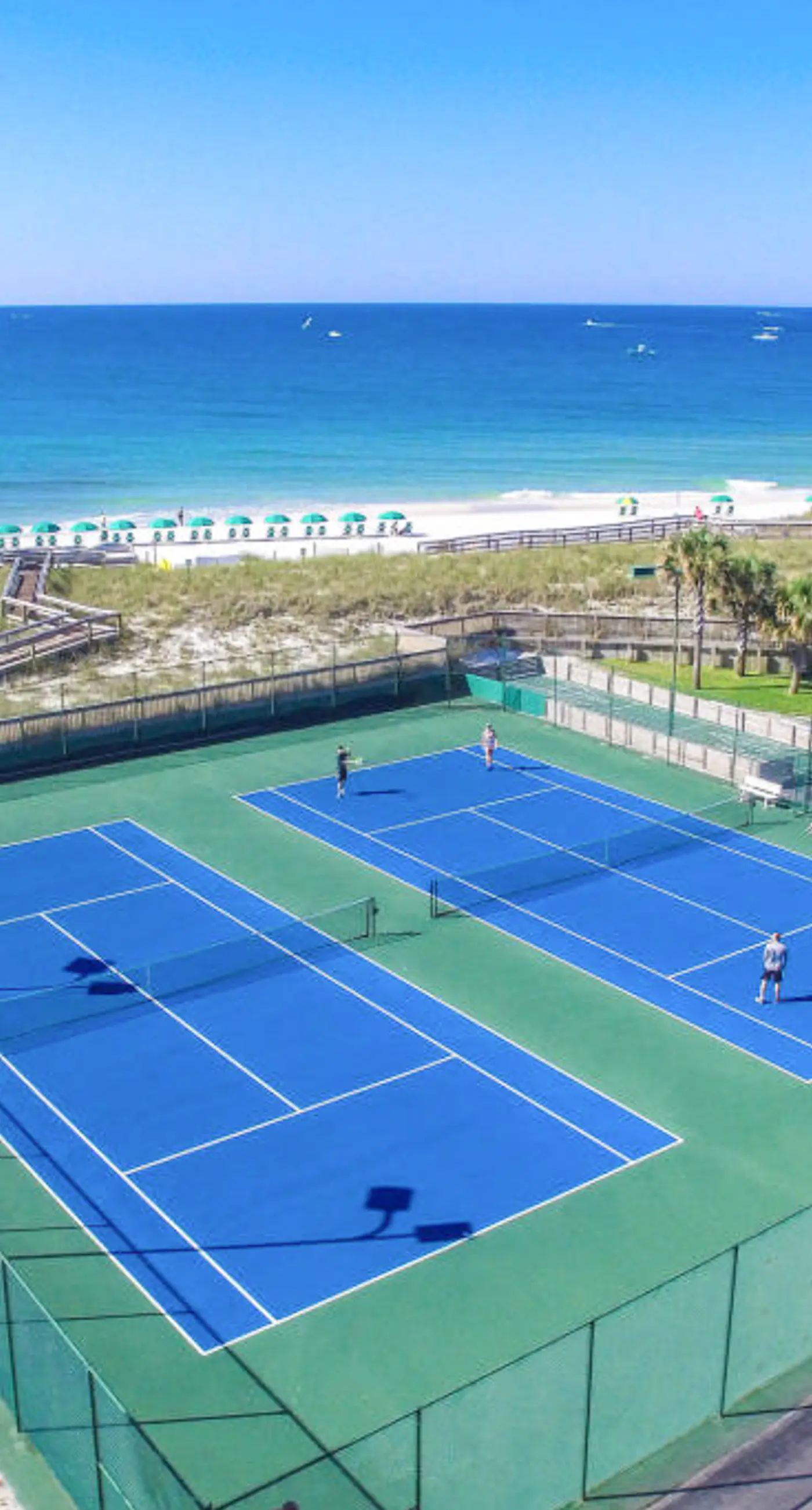 Water-view condo with heated pool, hot tub, sports courts & on-site beach access