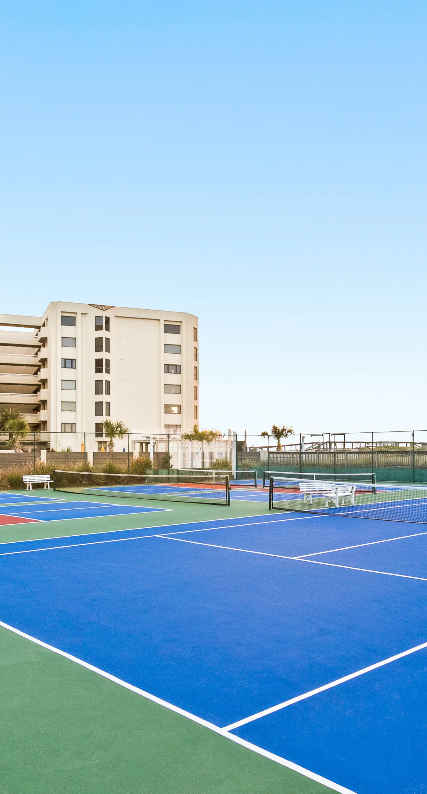 Water-view condo with heated pool, hot tub, sports courts & on-site beach access