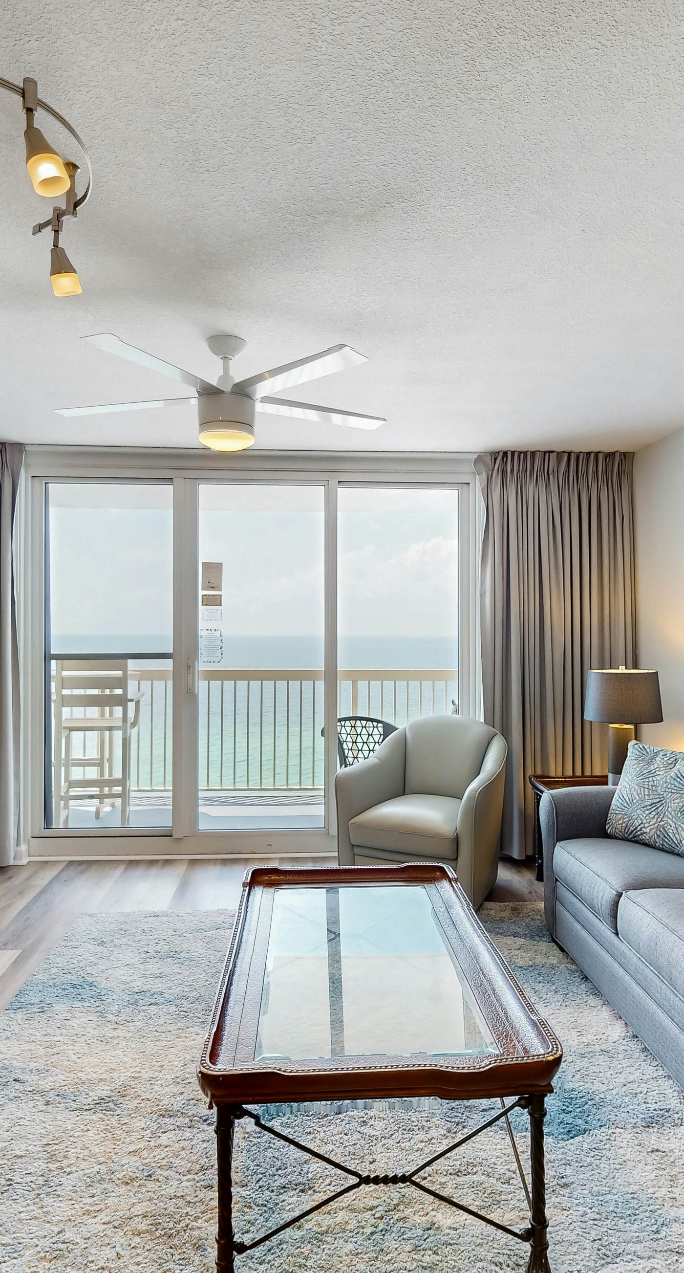 Gulf-front condo with pools, hot tubs, gym, beach access & scenic balcony