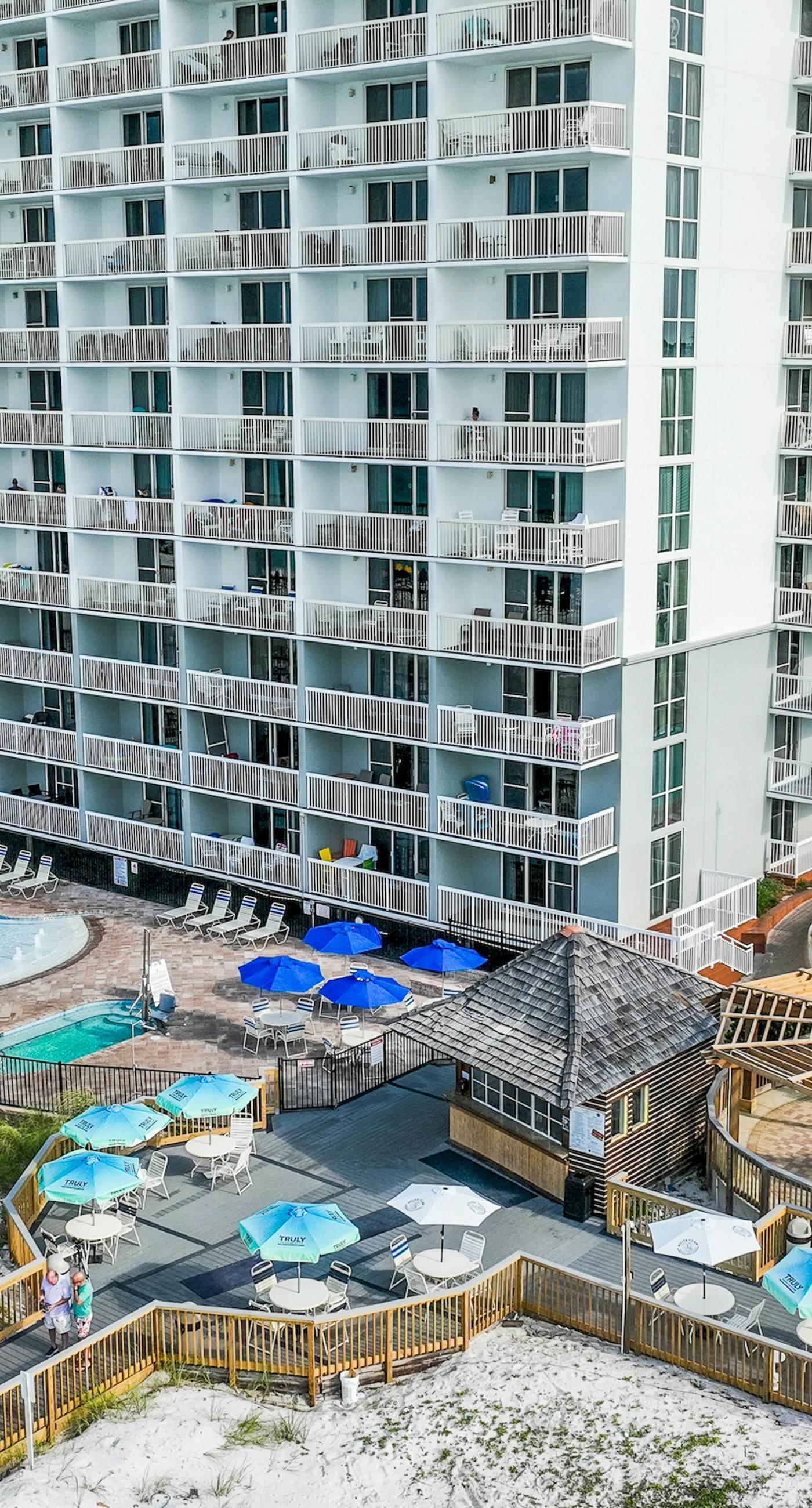 Gulf-front condo with pools, hot tubs, gym, beach access & scenic balcony