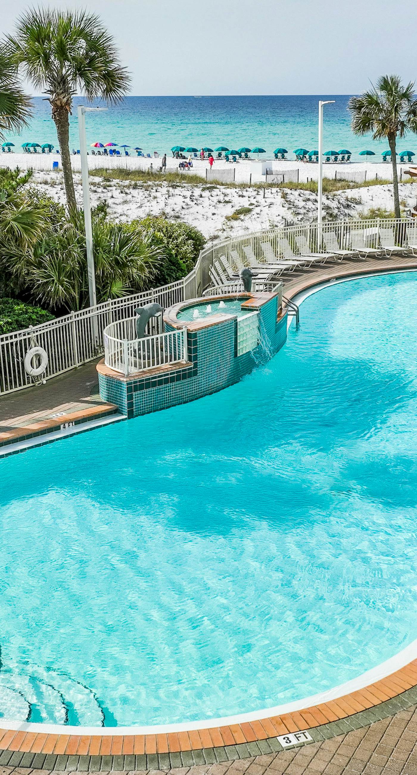 Gulf-front condo with pools, hot tubs, gym, beach access & scenic balcony