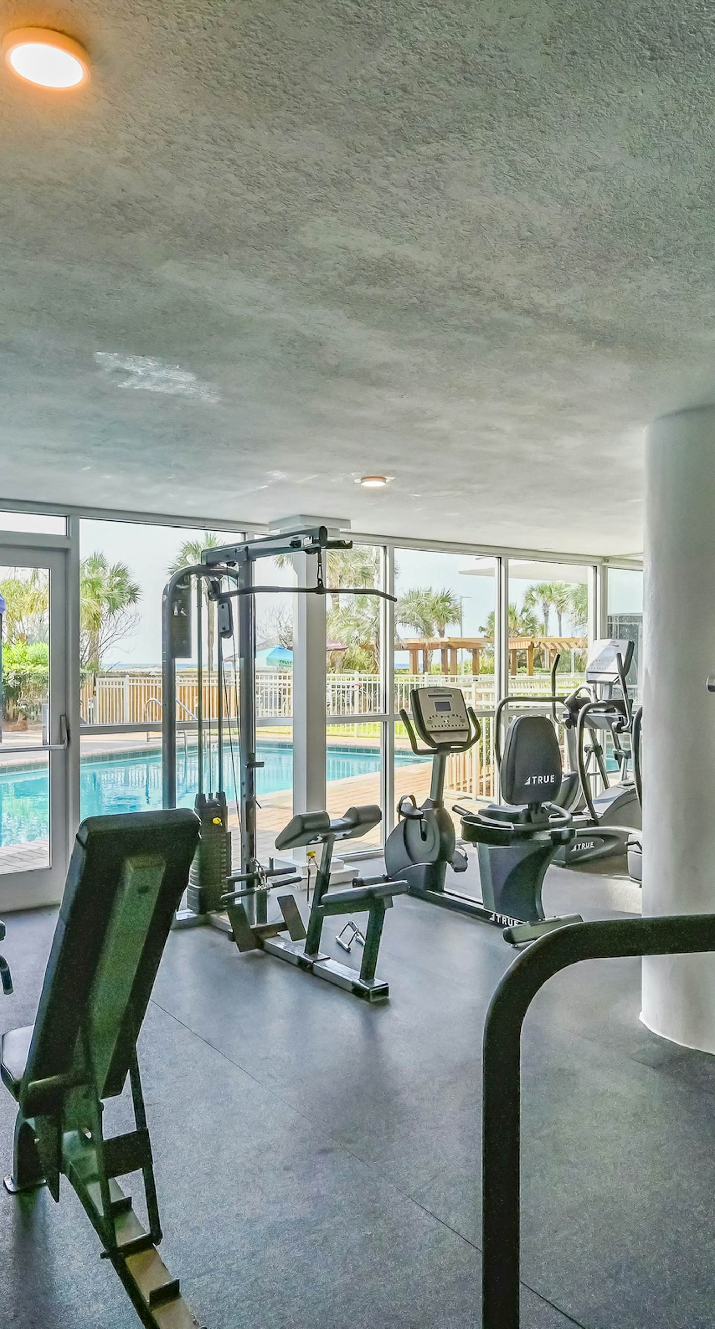 Gulf-front condo with pools, hot tubs, gym, beach access & scenic balcony