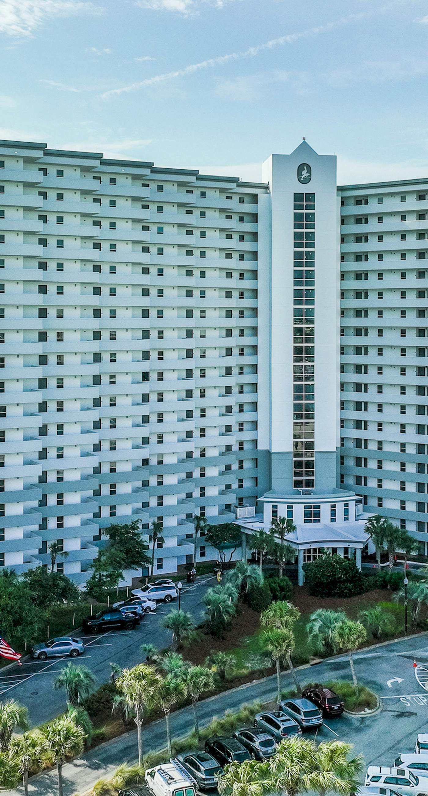 Gulf-front condo with pools, hot tubs, gym, beach access & scenic balcony