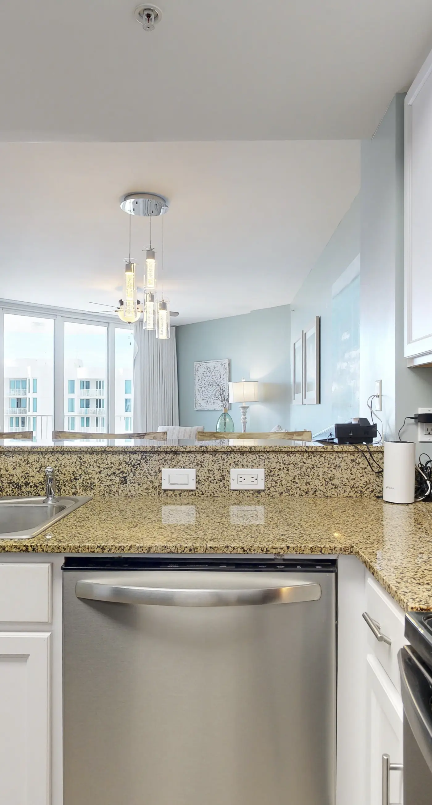 Water-view 11th-floor condo with hot tub, heated pool, tennis, sauna, gym, W/D