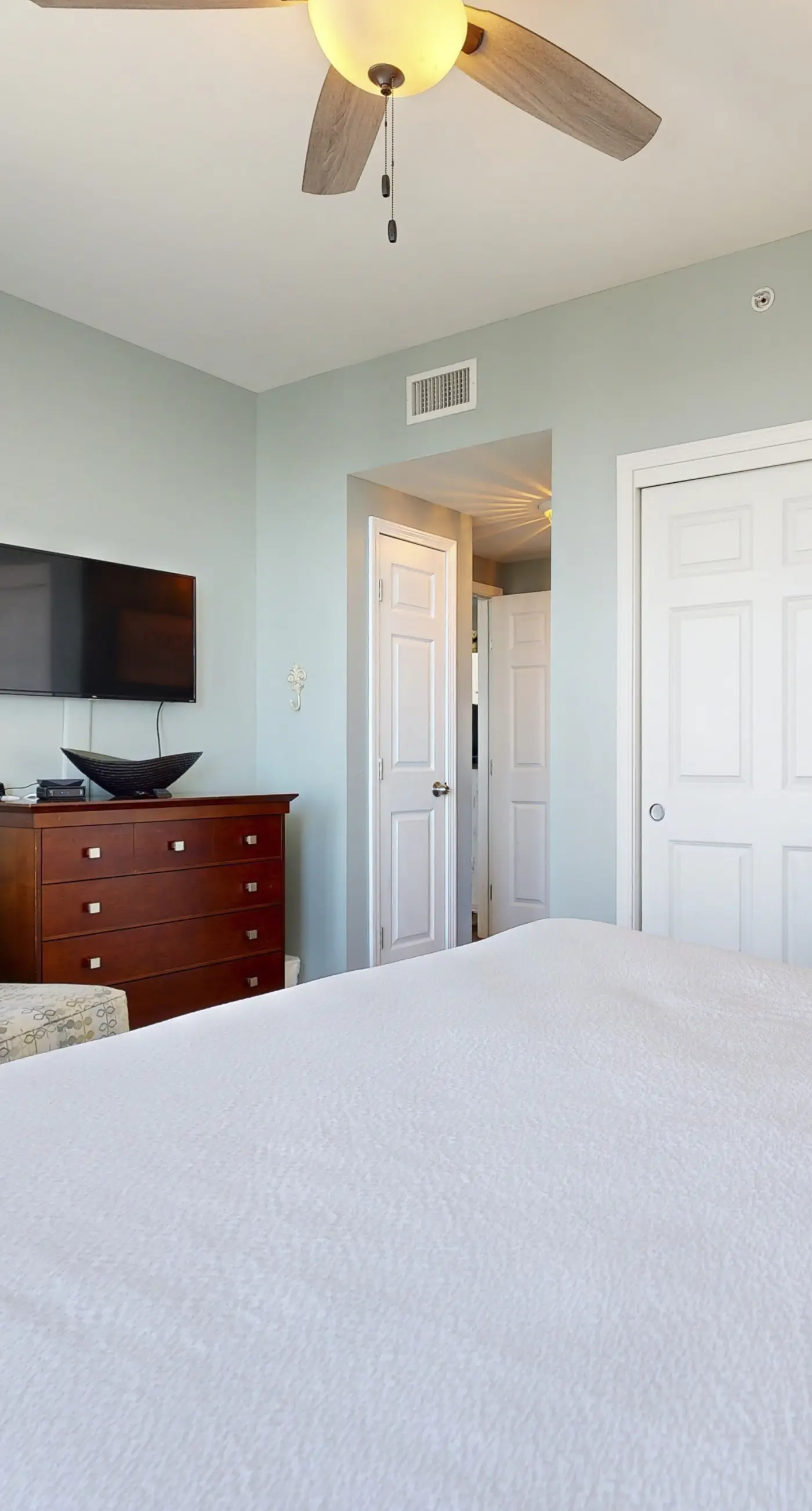 Water-view 11th-floor condo with hot tub, heated pool, tennis, sauna, gym, W/D