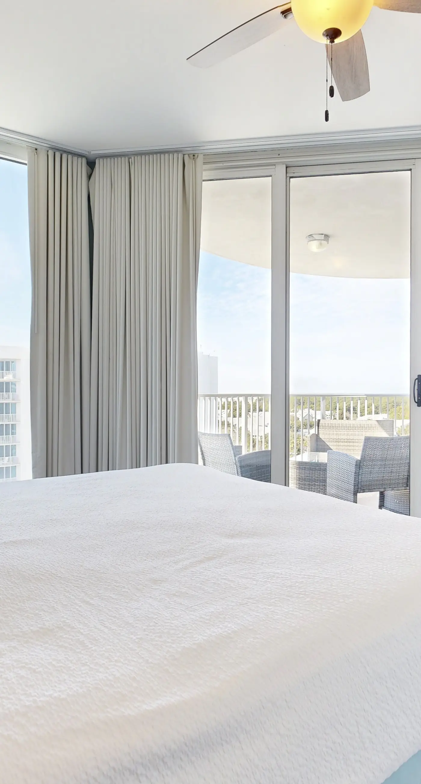 Water-view 11th-floor condo with hot tub, heated pool, tennis, sauna, gym, W/D