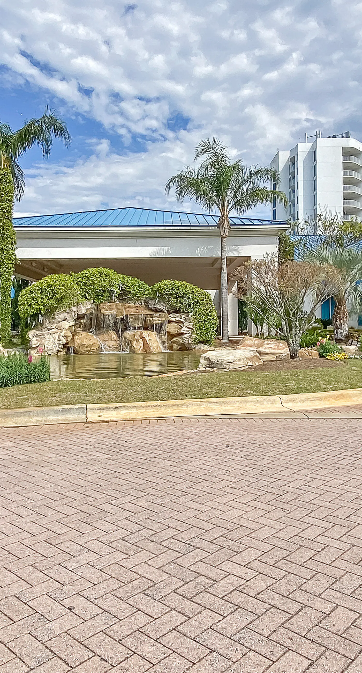 Water-view 11th-floor condo with hot tub, heated pool, tennis, sauna, gym, W/D