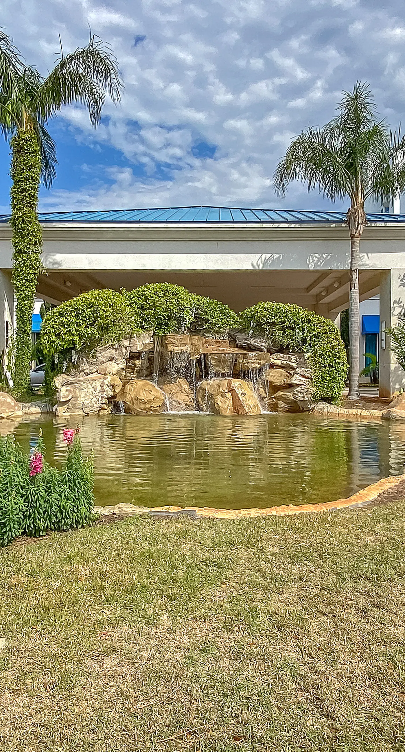 Water-view 11th-floor condo with hot tub, heated pool, tennis, sauna, gym, W/D