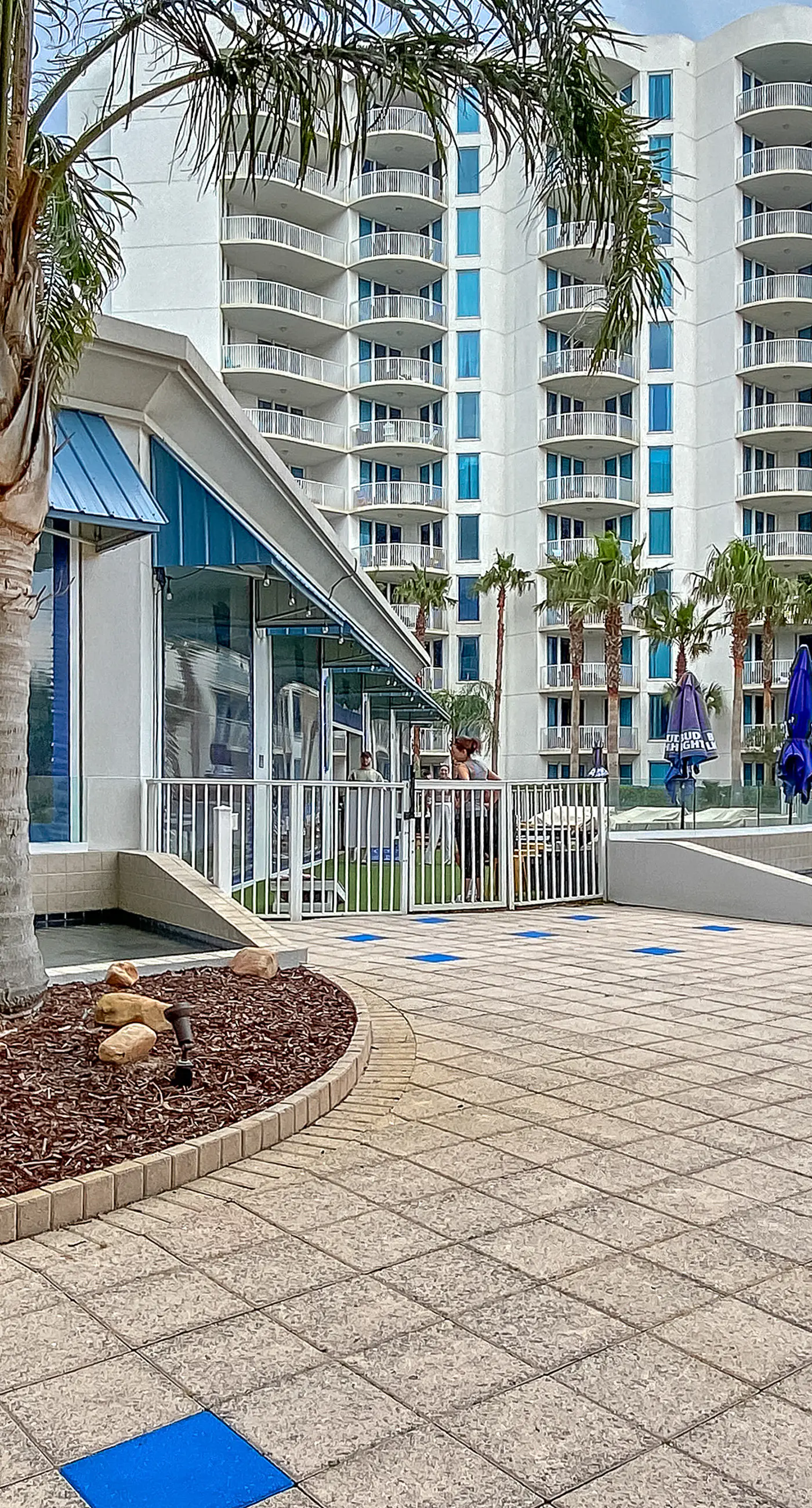 Water-view 11th-floor condo with hot tub, heated pool, tennis, sauna, gym, W/D