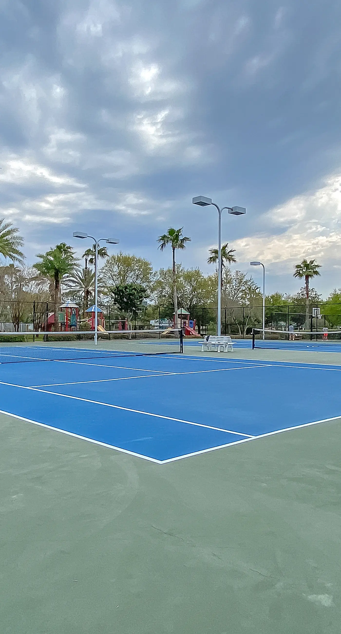 Water-view 11th-floor condo with hot tub, heated pool, tennis, sauna, gym, W/D