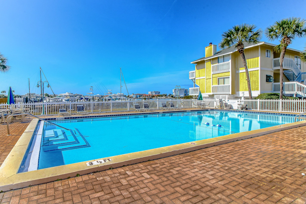 Inviting condo with dock, pool, hot tub & private beach - dog-friendly