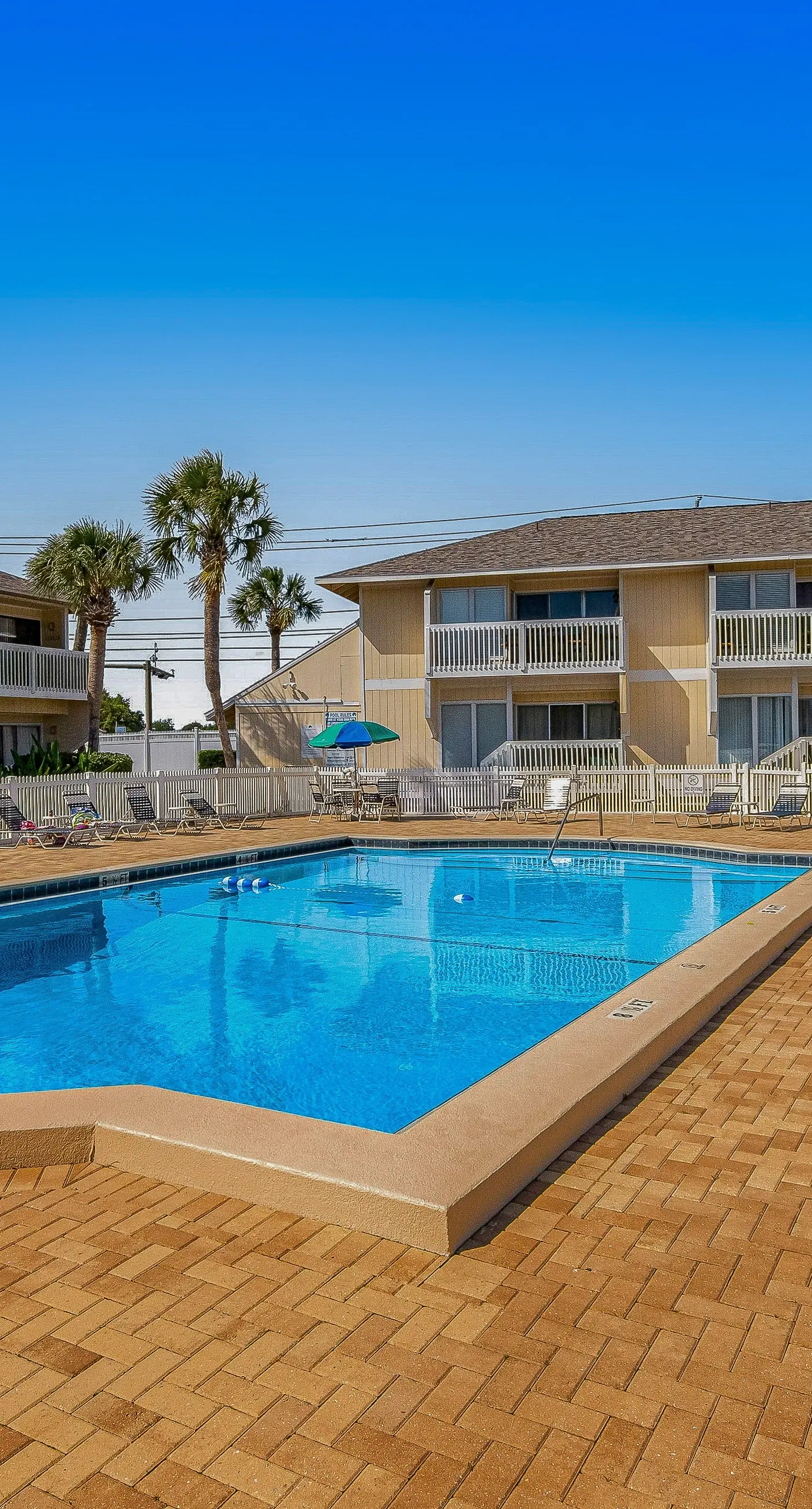Inviting condo with dock, pool, hot tub & private beach - dog-friendly