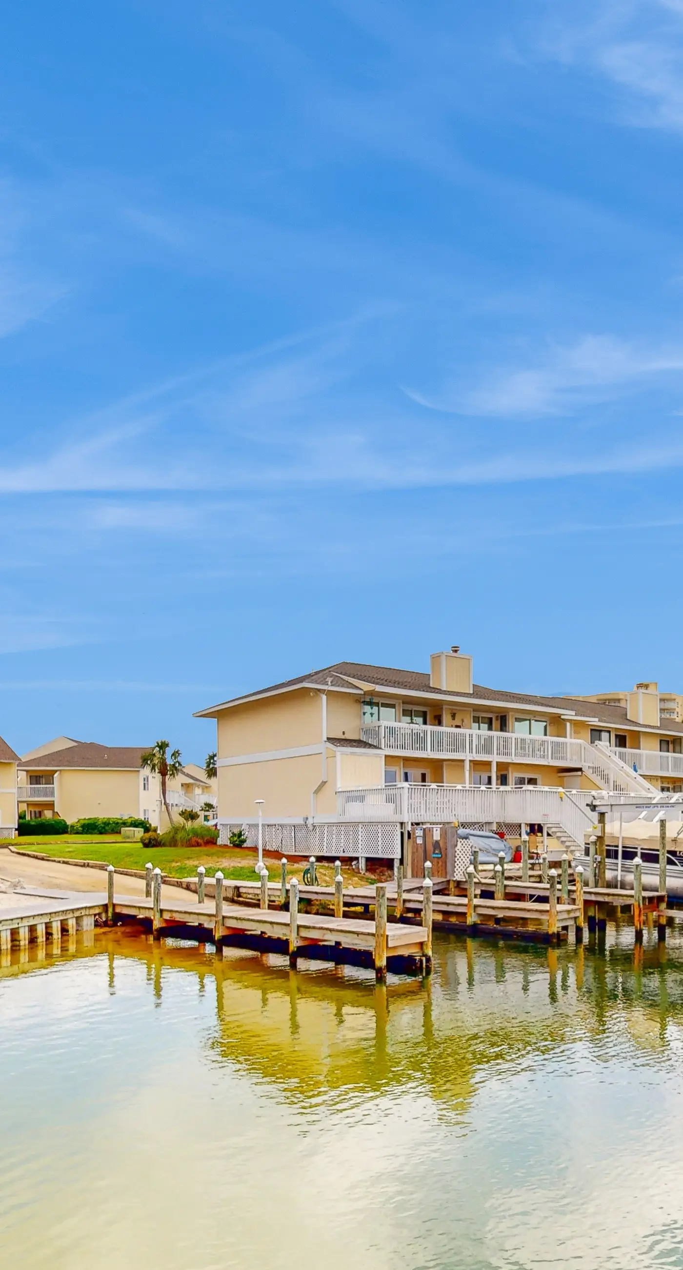 Inviting condo with dock, pool, hot tub & private beach - dog-friendly