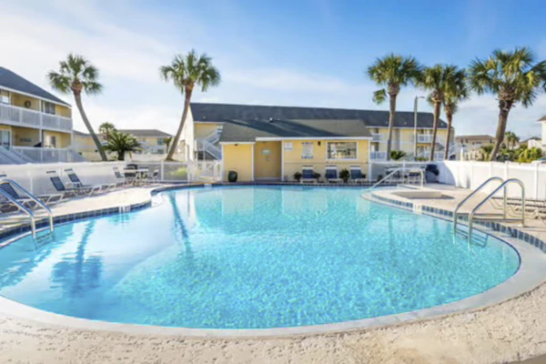 Beachside dog-friendly retreat with pools, hot tub, golf & beach service