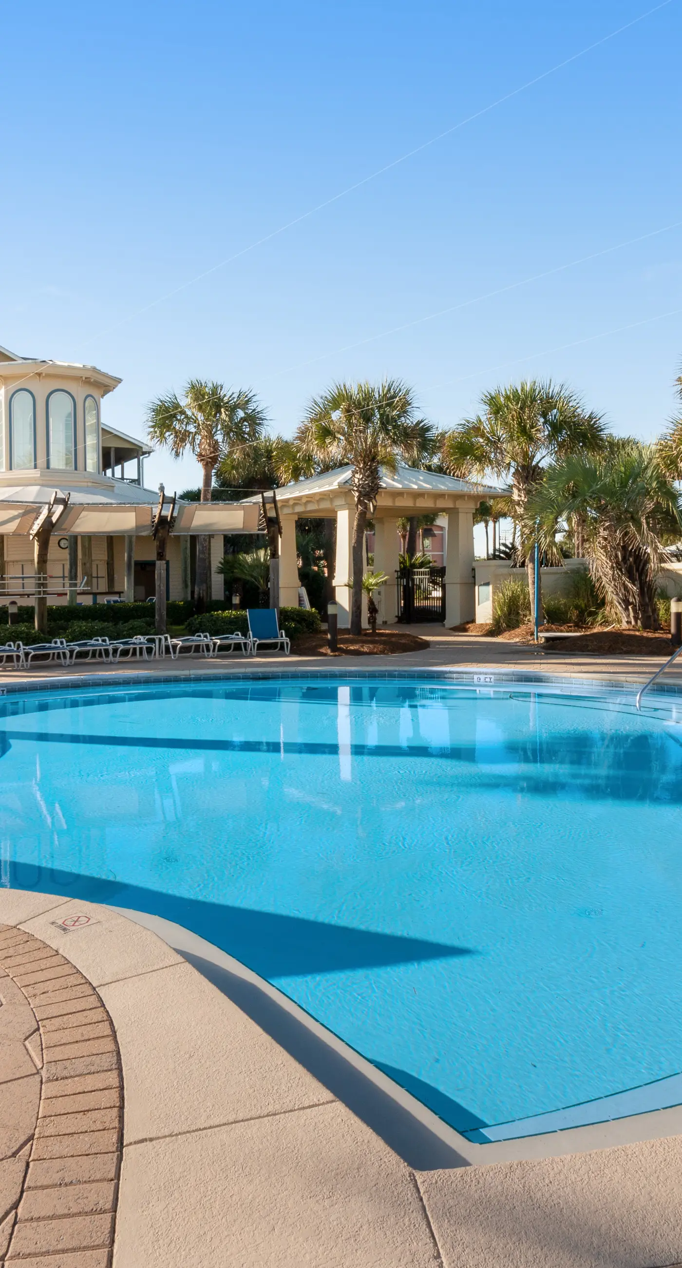 Ocean-view 5th-floor condo with heated outdoor pool, gym, balcony, BBQ area