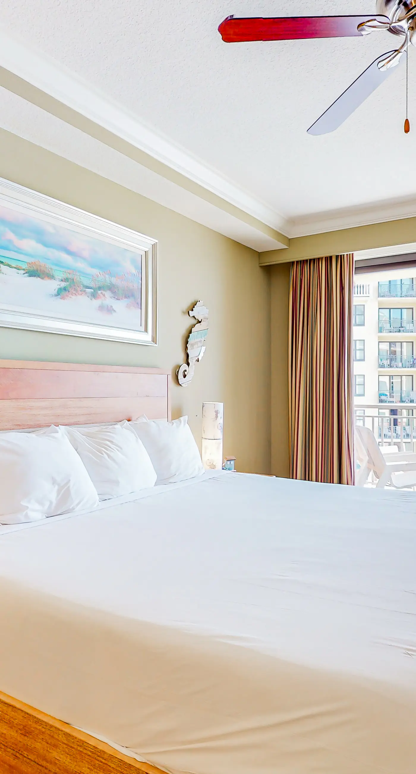 Gulf-view condo with beach access, pool, hot tub, sauna, & private balcony