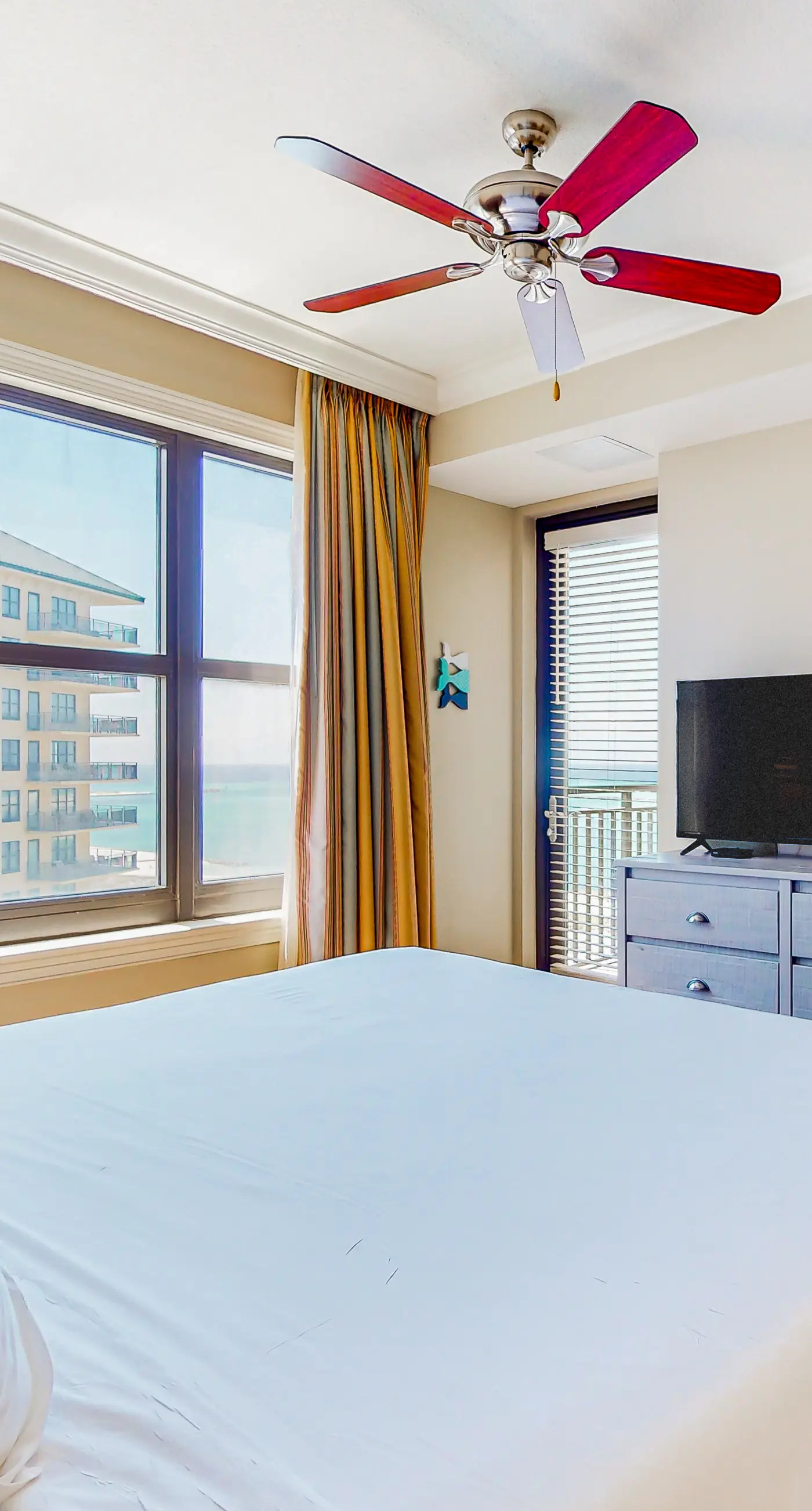 Gulf-view condo with beach access, pool, hot tub, sauna, & private balcony