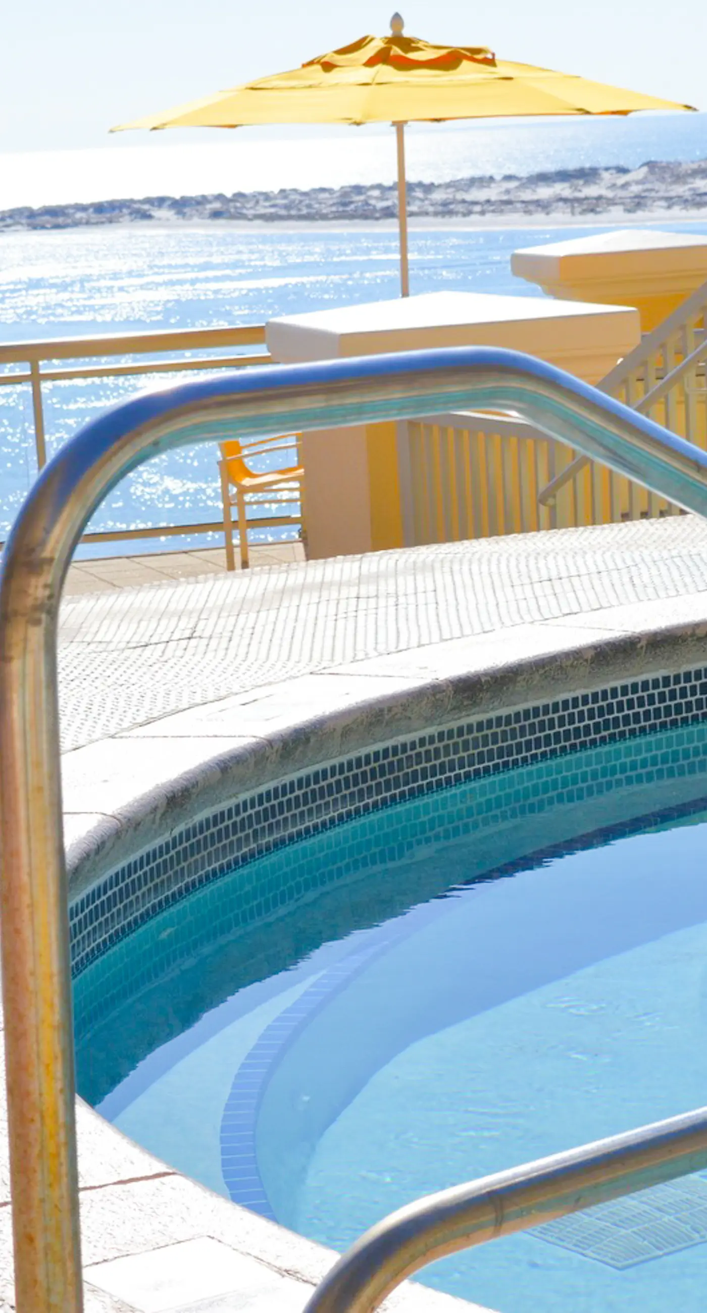 Gulf-view condo with beach access, pool, hot tub, sauna, & private balcony